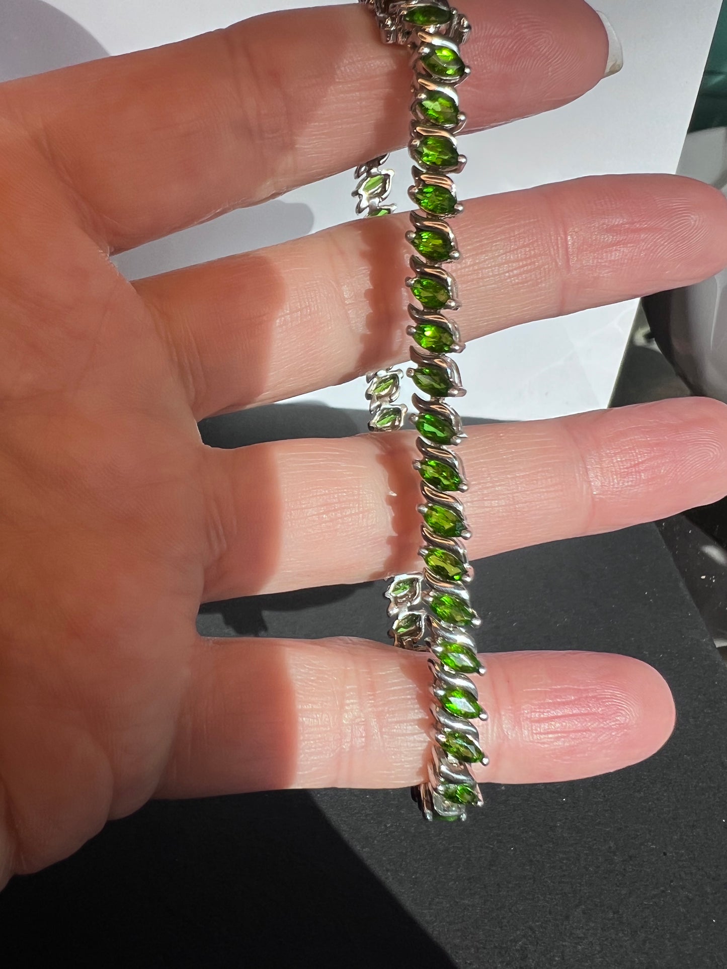 Chrome diopside tennis bracelet in rhodium over sterling silver