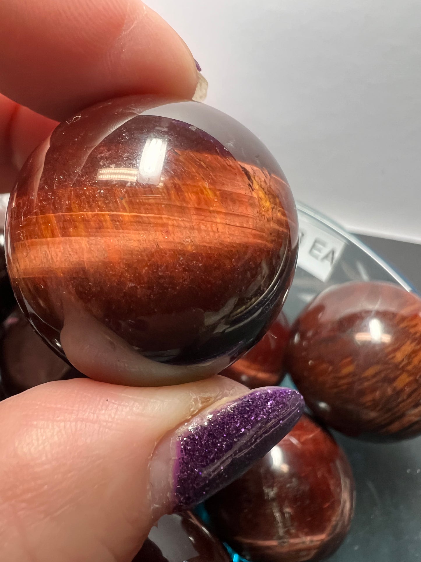 Red tigers eye sphere