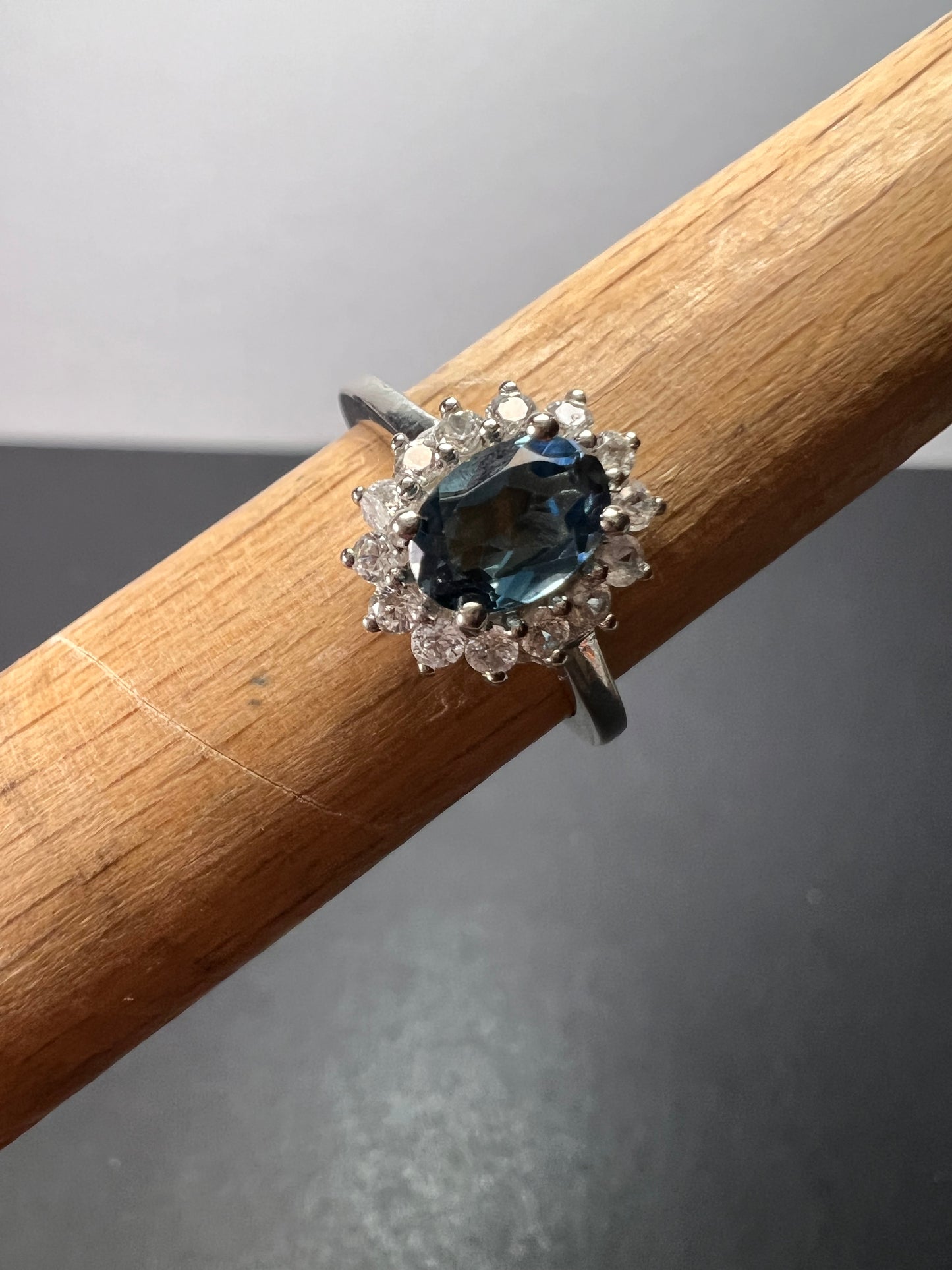 London blue topaz sunburst halo ring in platinum over sterling silver. ctw 1.40 size 5