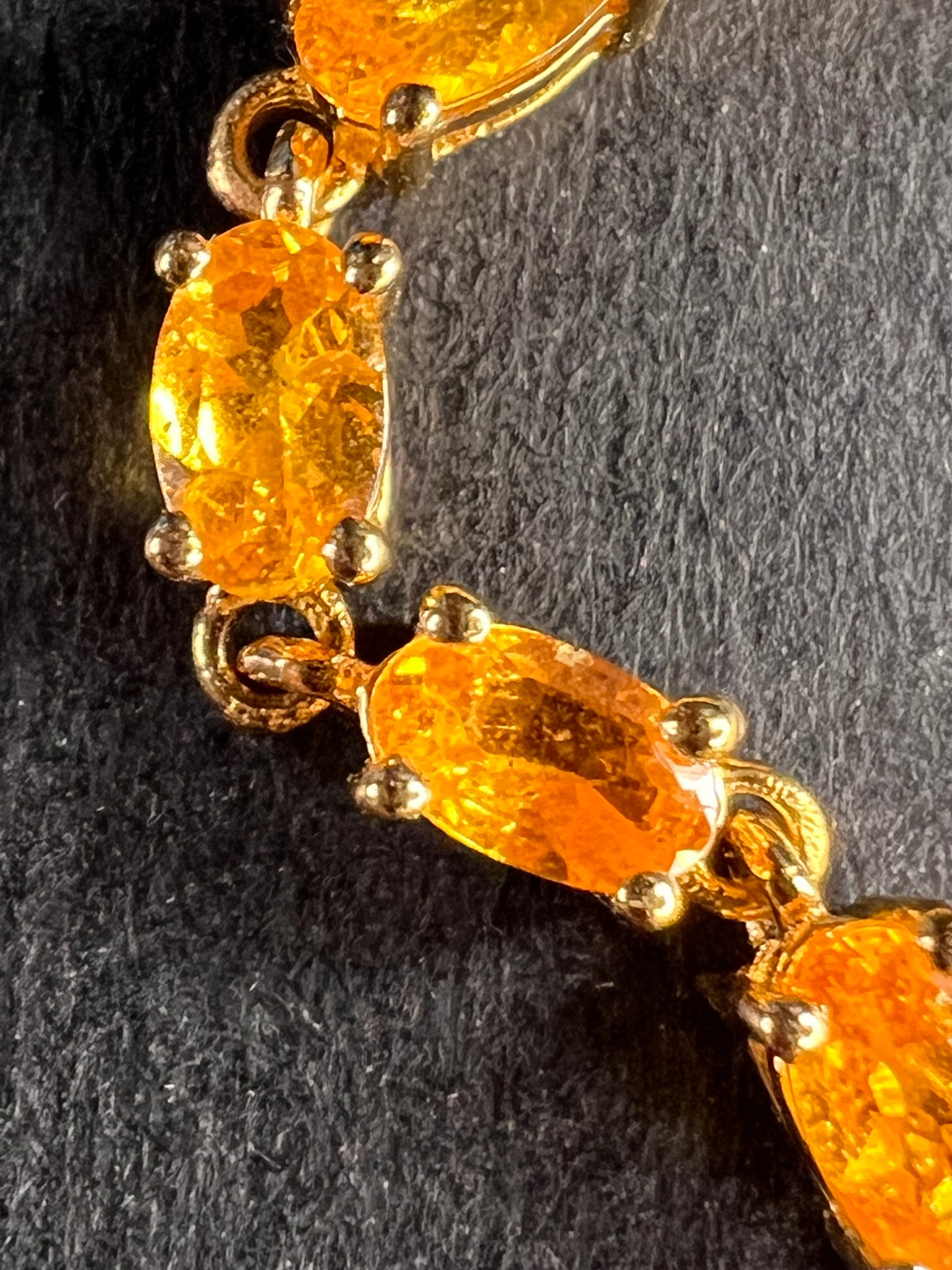 Yellow spessartine garnet tennis bracelet in gold over sterling silver