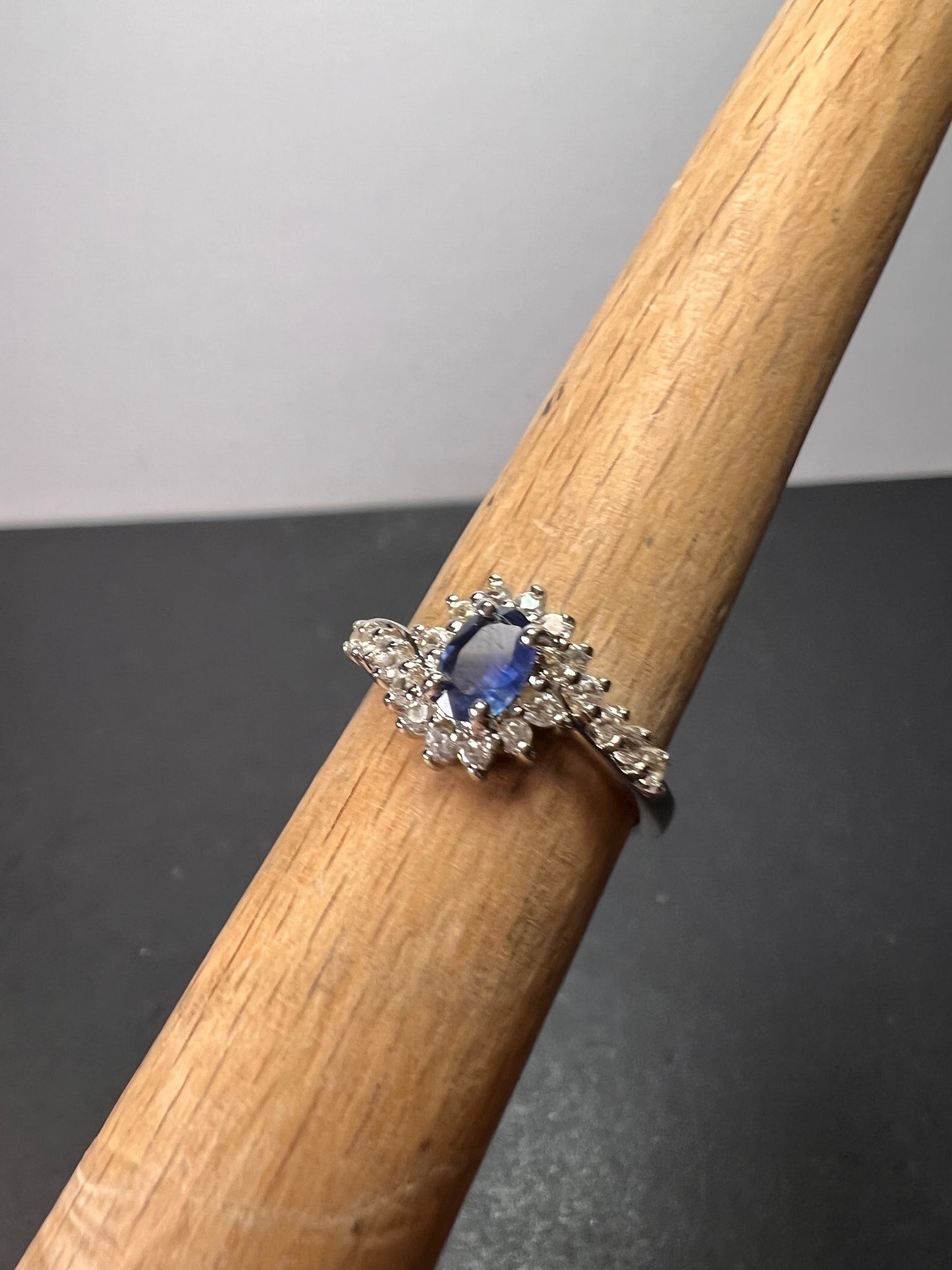 Blue sapphire and zircon floral ring in platinum over sterling silver size 5