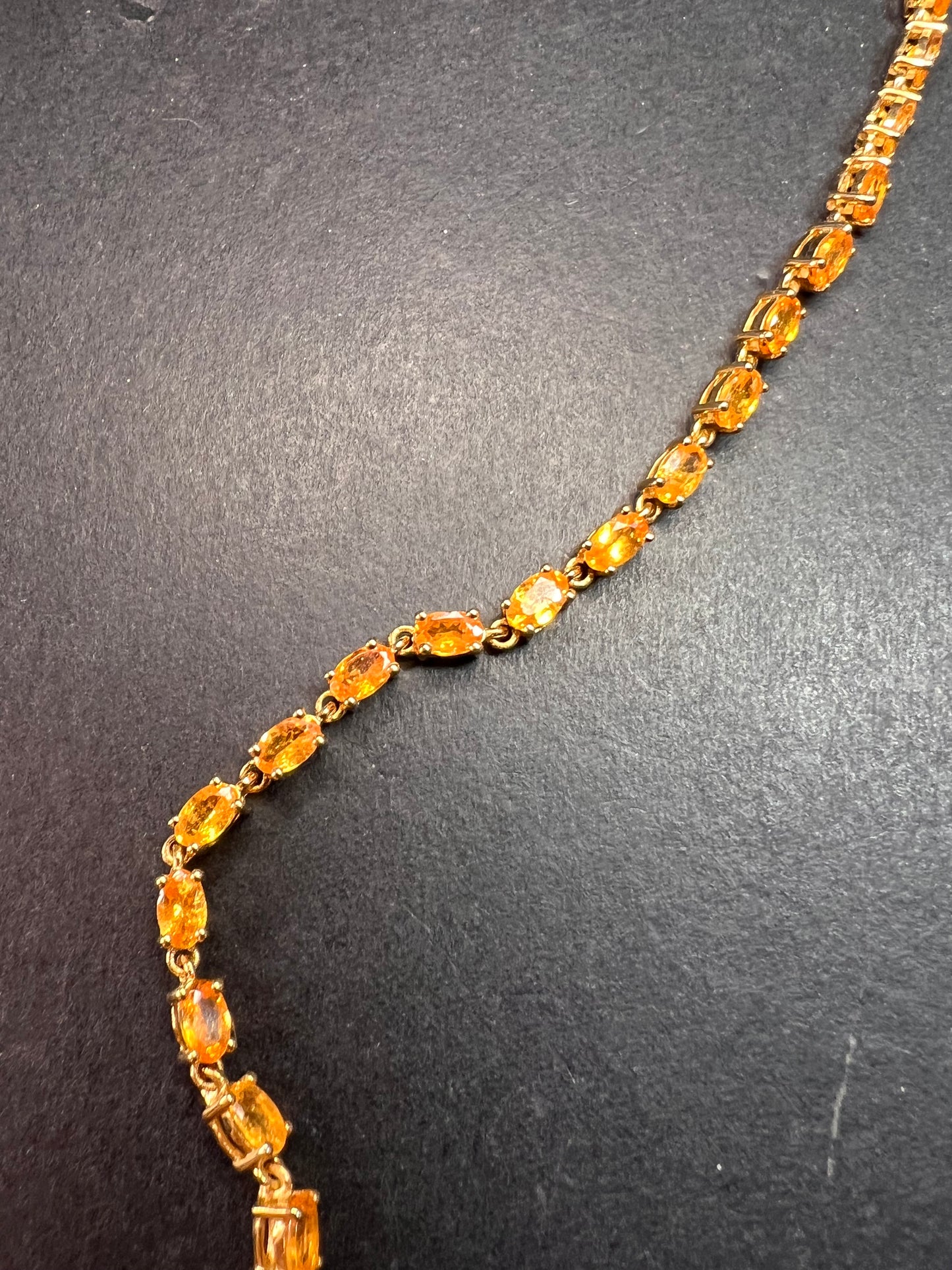 Yellow spessartine garnet tennis bracelet in gold over sterling silver
