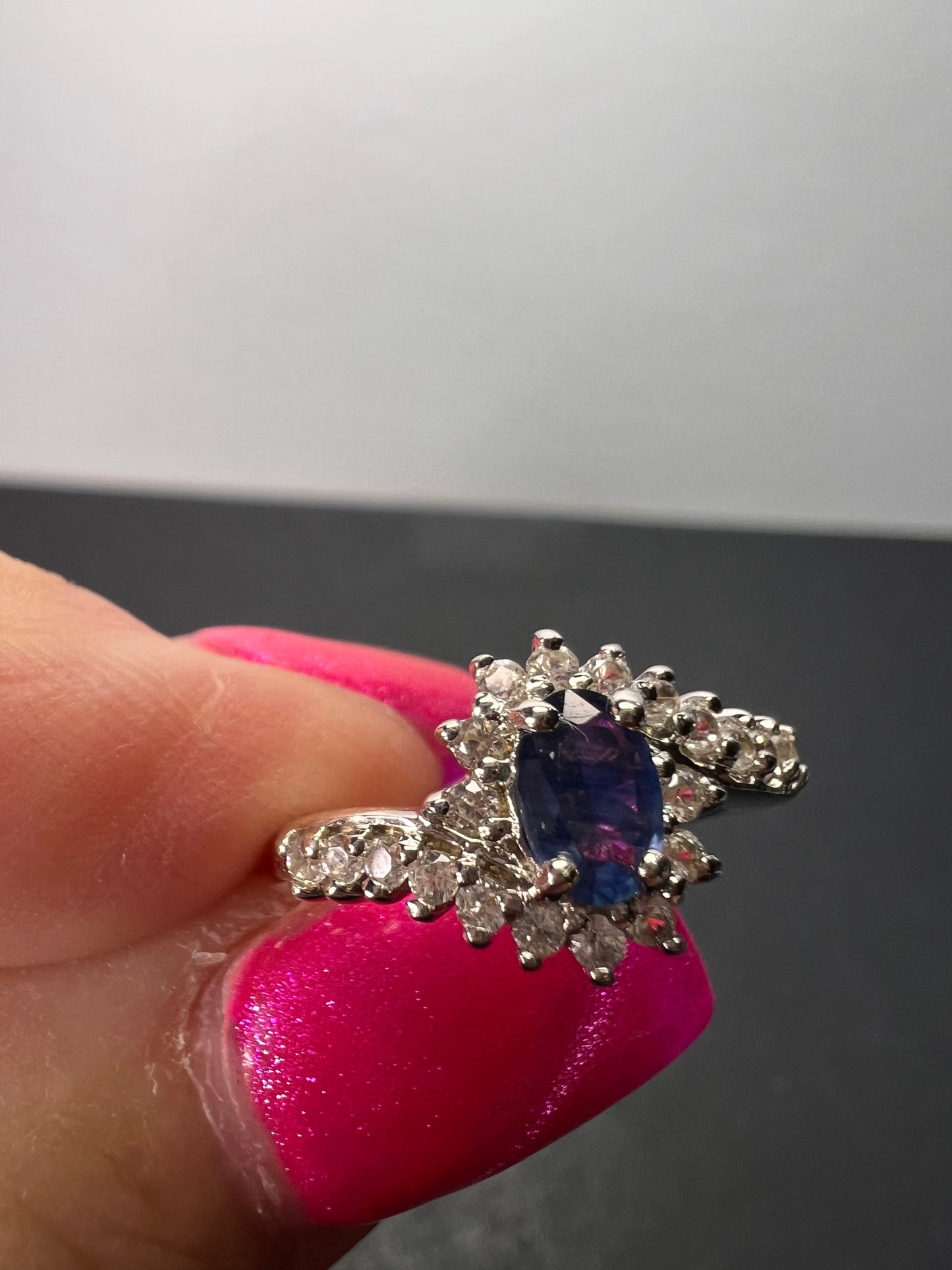 Blue sapphire and zircon floral ring in platinum over sterling silver size 5