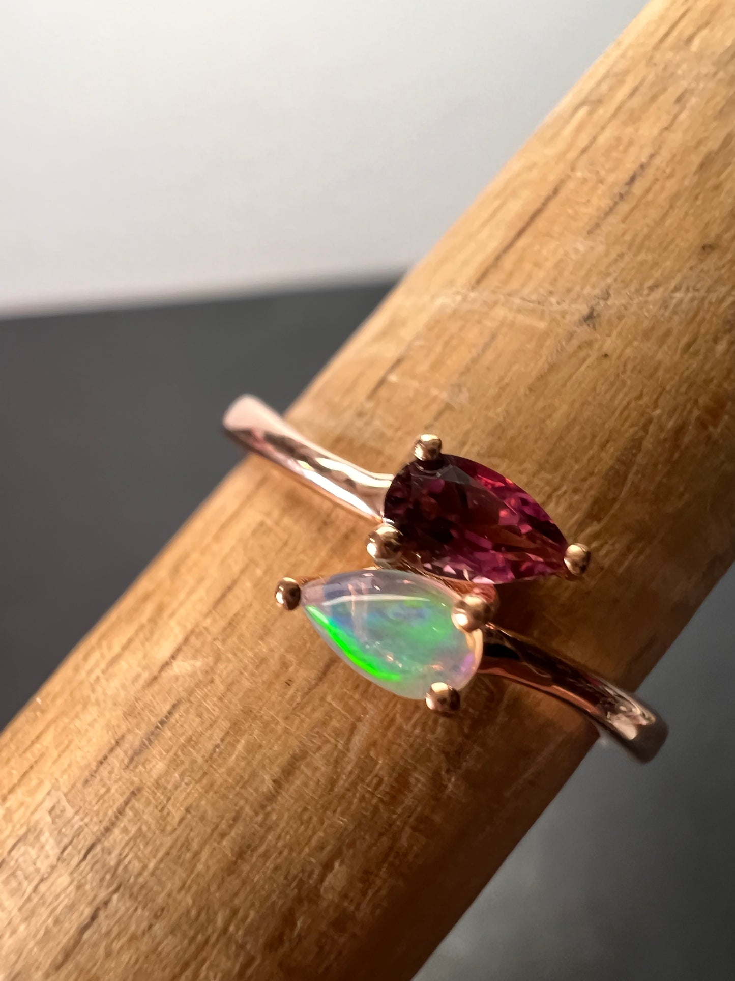 Rubellite and Ethiopian welo opal bypass ring in rose gold vermeil over sterling silver size 7. .35ctw