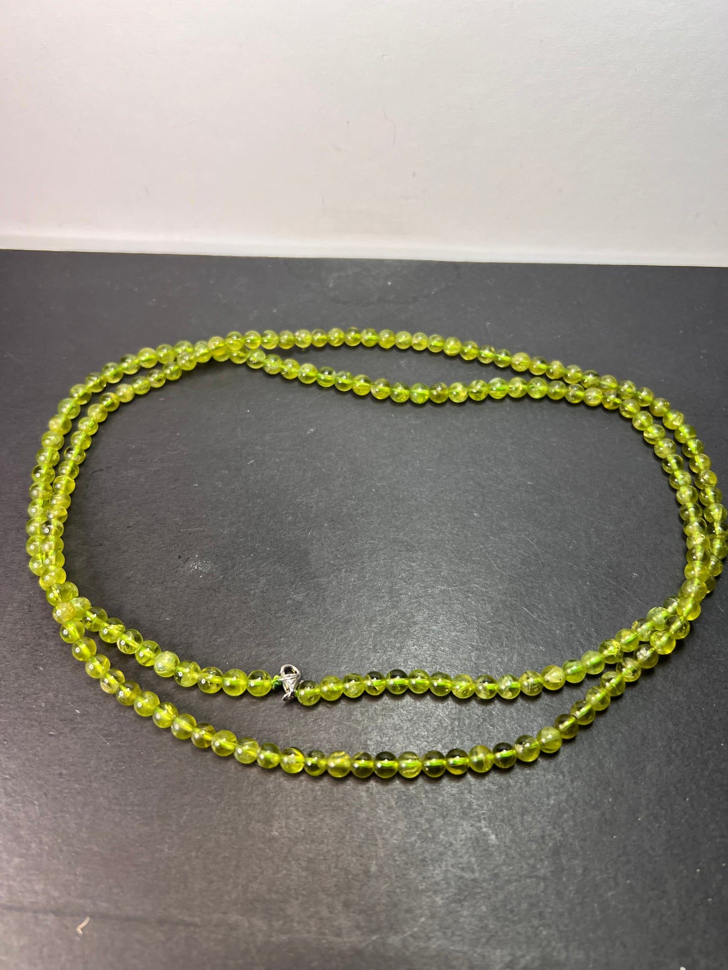 6mm high grade peridot beaded 36 inch necklace with sterling silver clasp