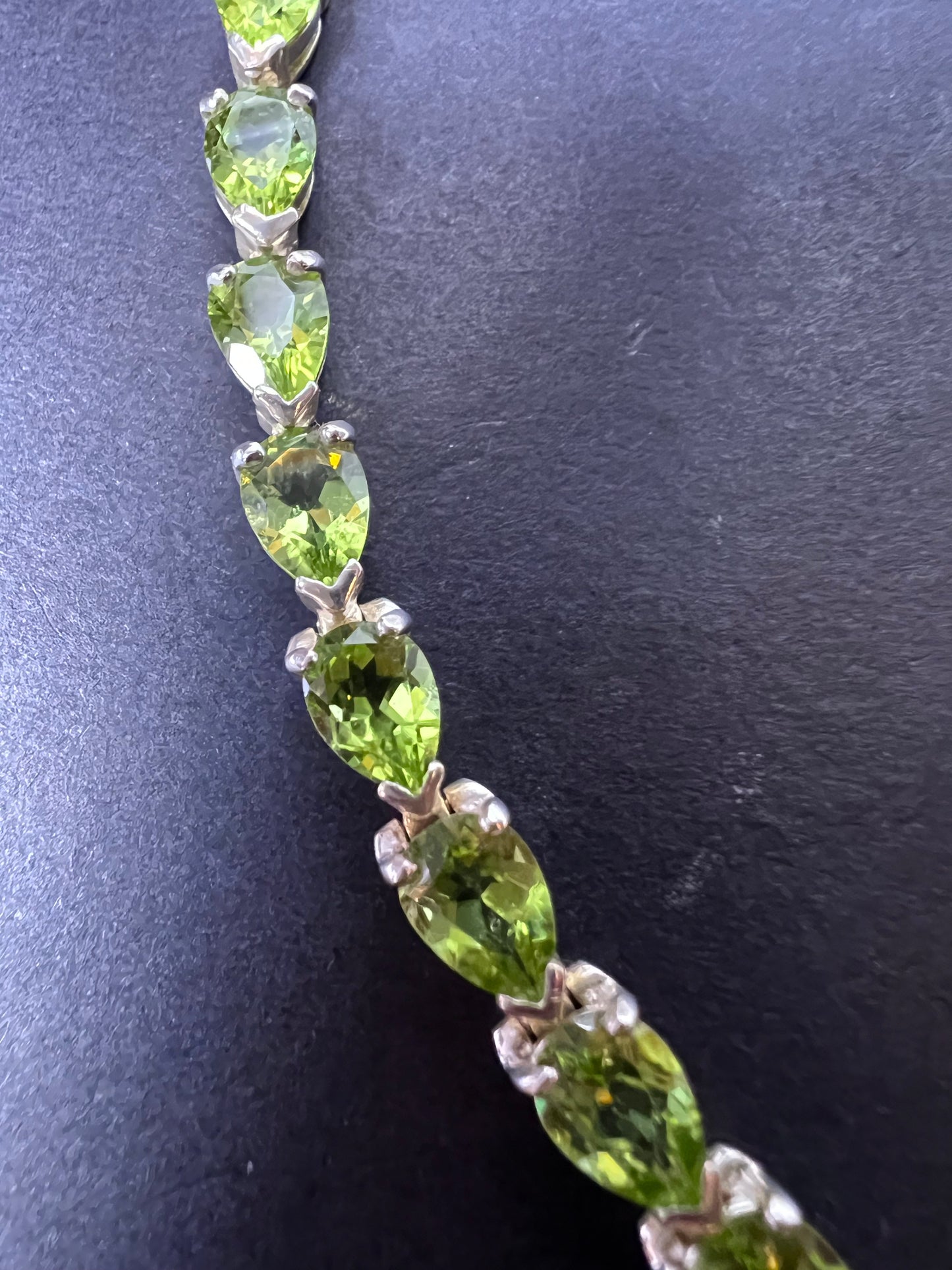 Peridot and sterling silver tennis bracelet