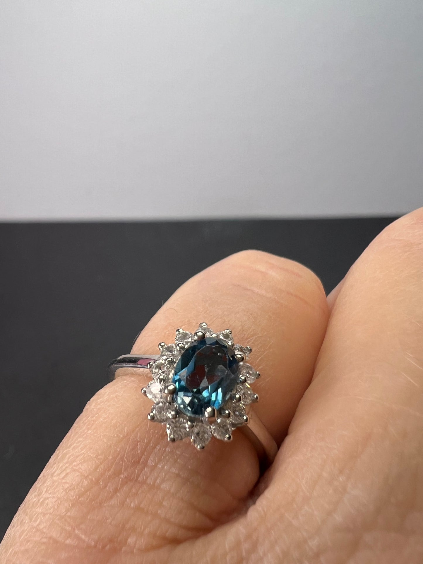 London blue topaz sunburst halo ring in platinum over sterling silver. ctw 1.40 size 5