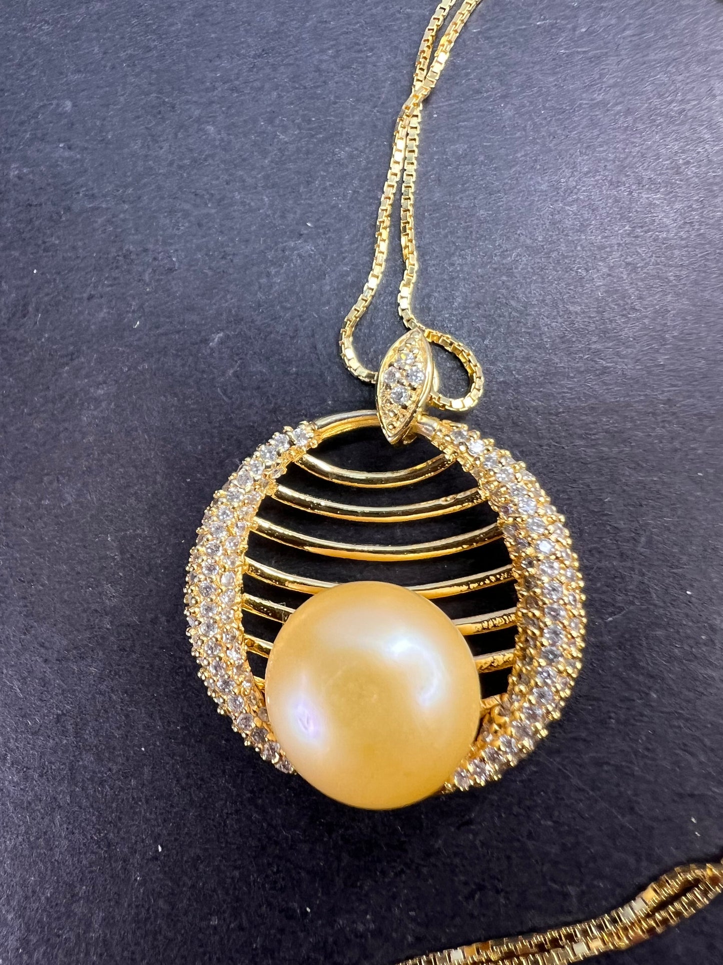 Golden yellow cultured pearl pendant in gold over sterling silver with chain