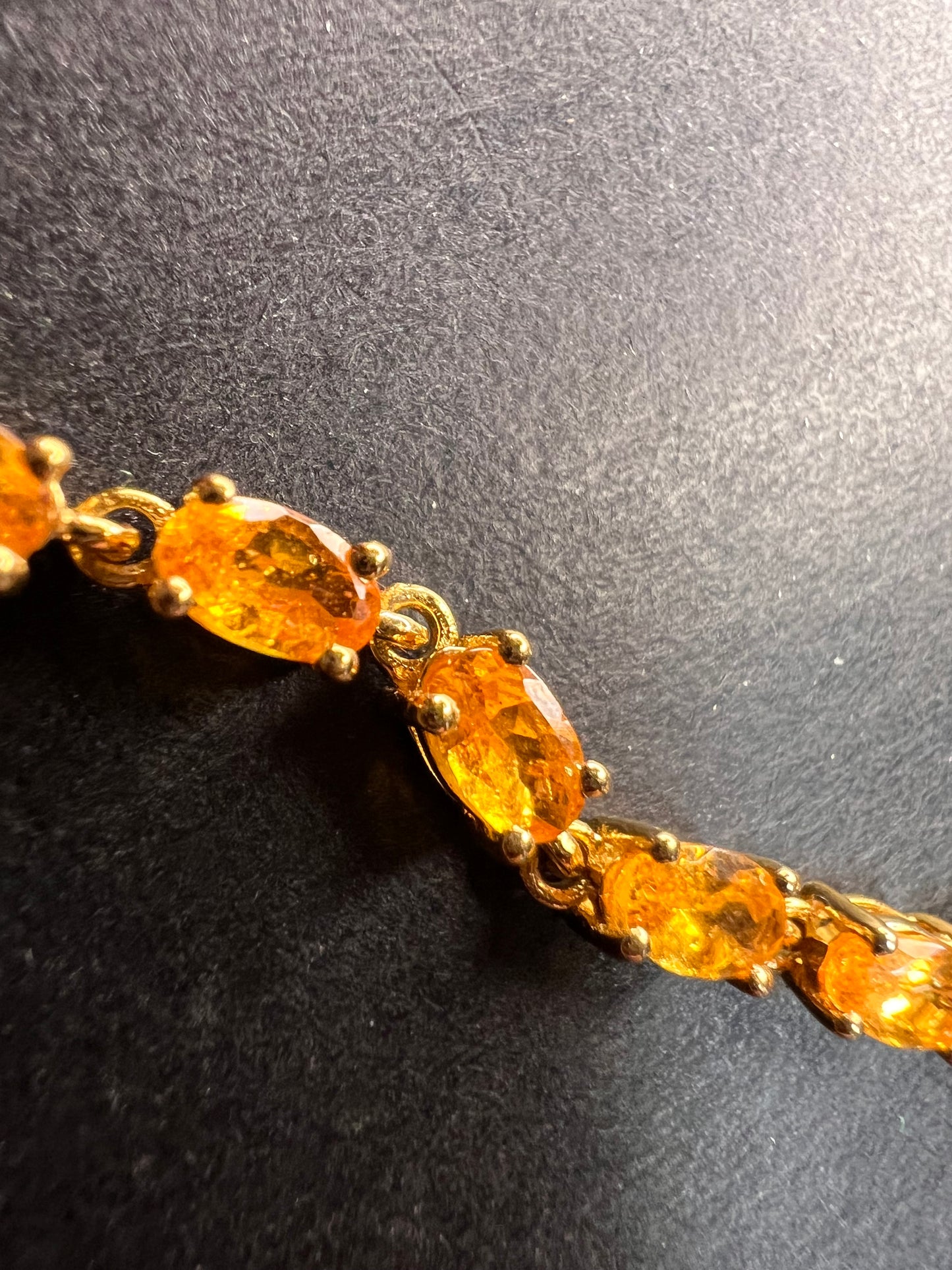 Yellow spessartine garnet tennis bracelet in gold over sterling silver