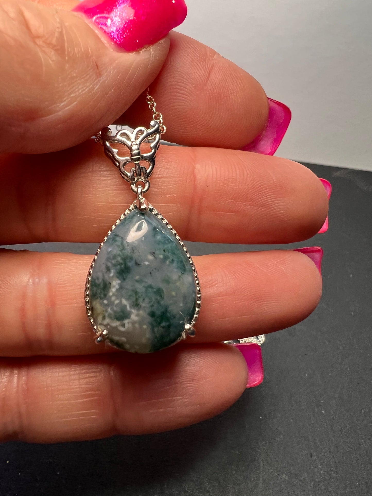 Moss agate teardrop pendant with butterfly in platinum over copper with 18 inch chain