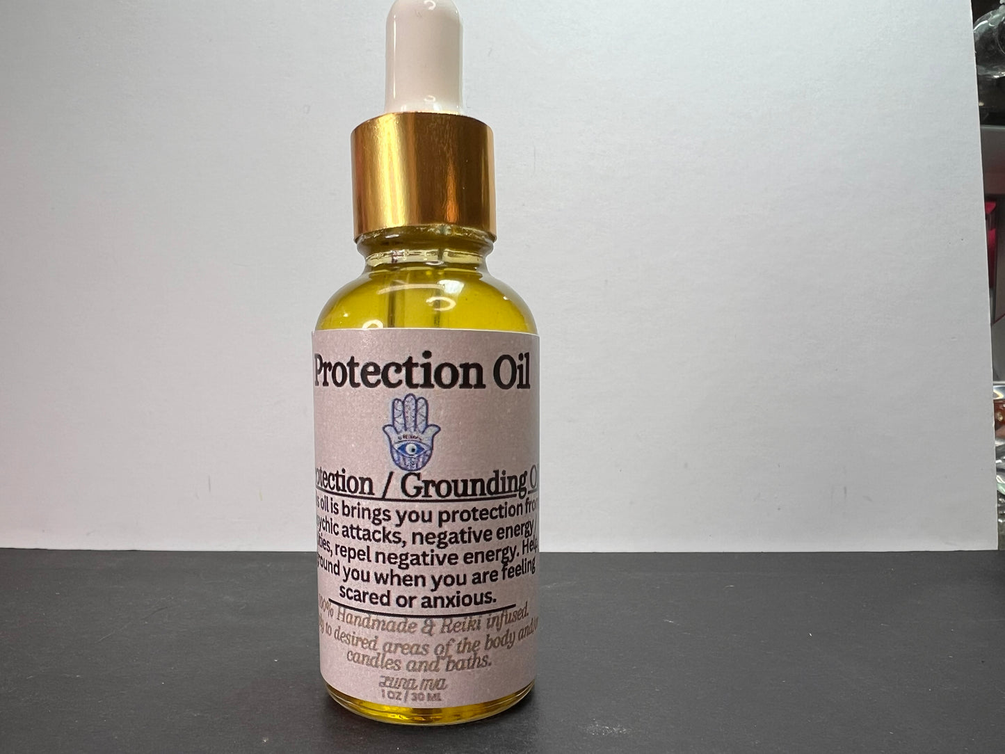 Protection and grounding oil by Luna Mia