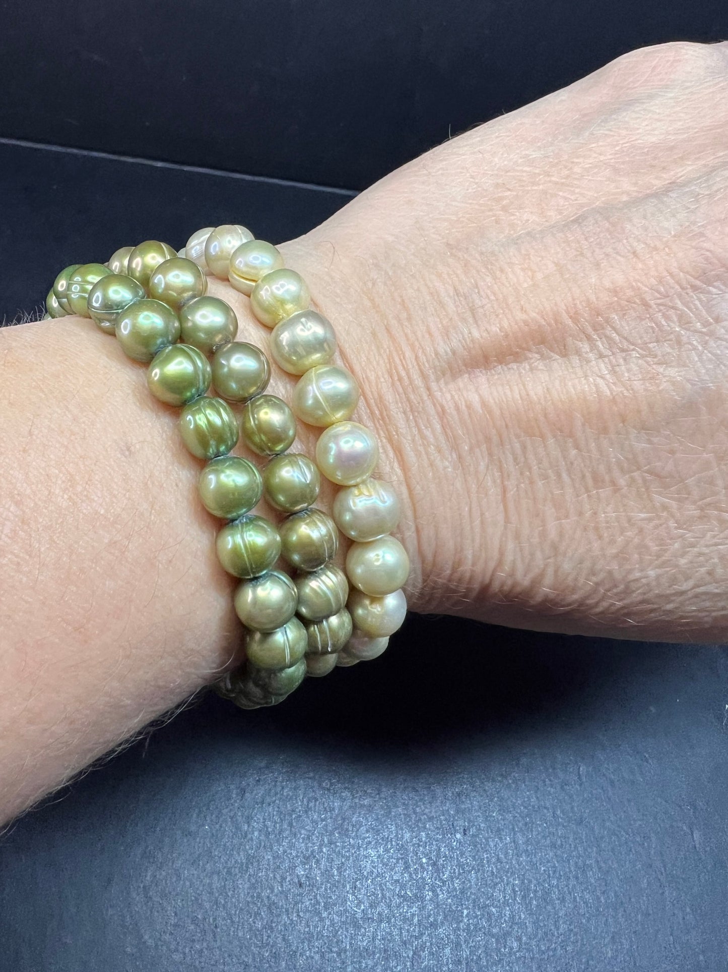Set of three freshwater pearl shades of green stretch bracelets