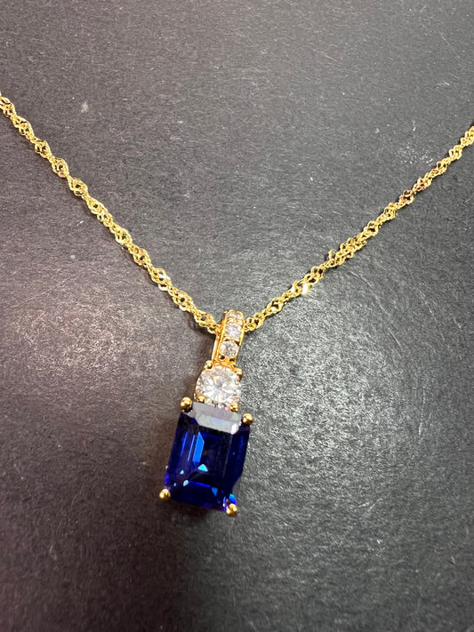 Blue emerald cut CZ pendant and chain necklace in gold over sterling silver 18 inches