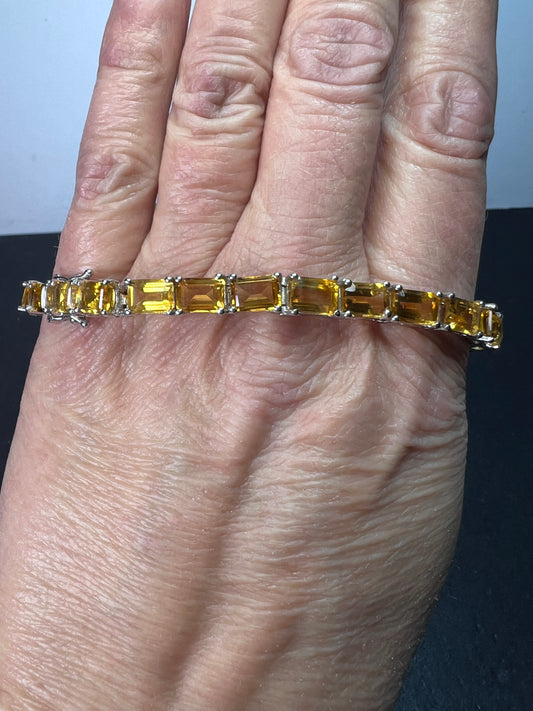 New emerald cut yellow citrine tennis bracelet in rhodium over sterling