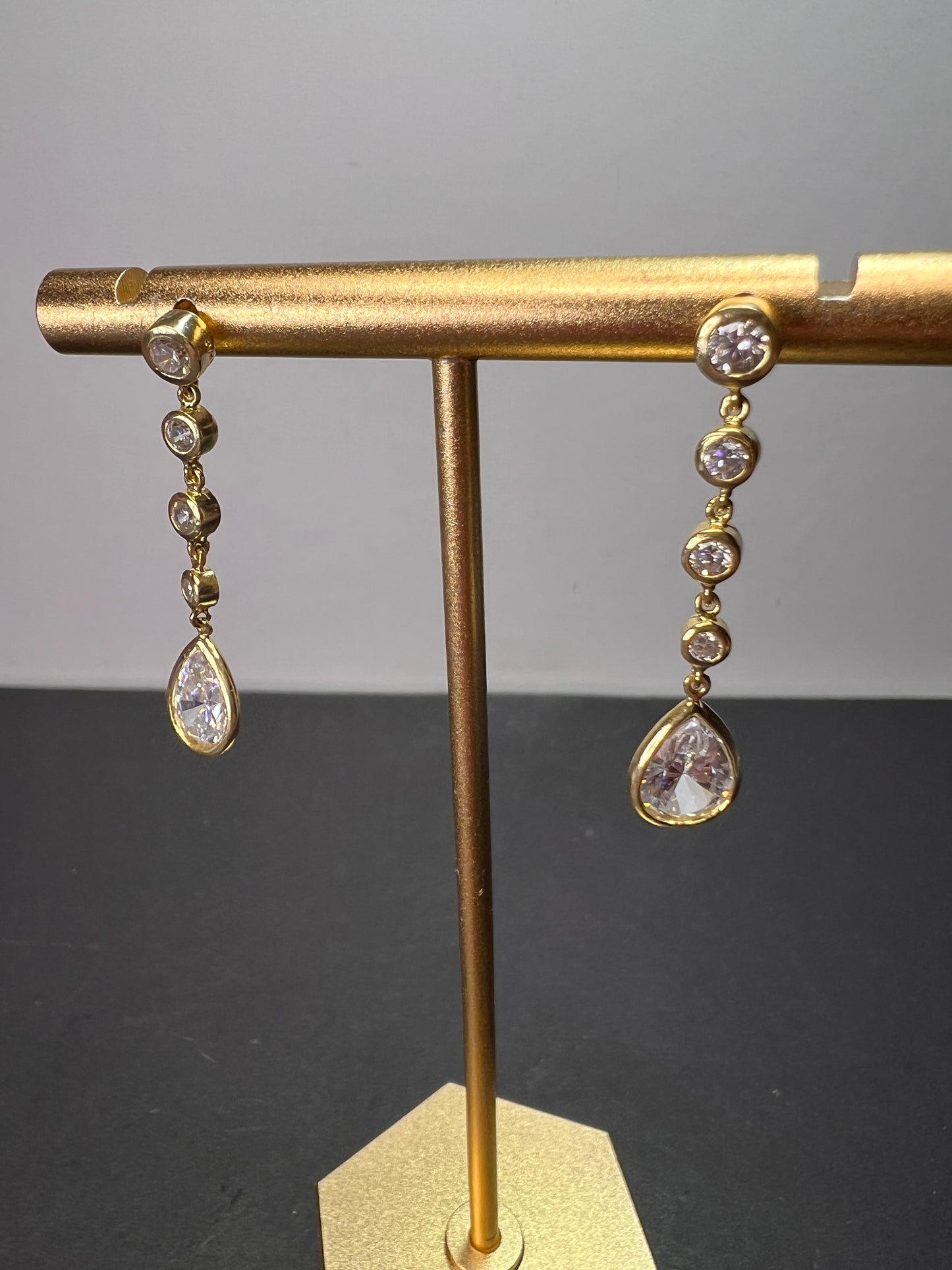 Long teardrop CZ earrings in gold over sterling silver