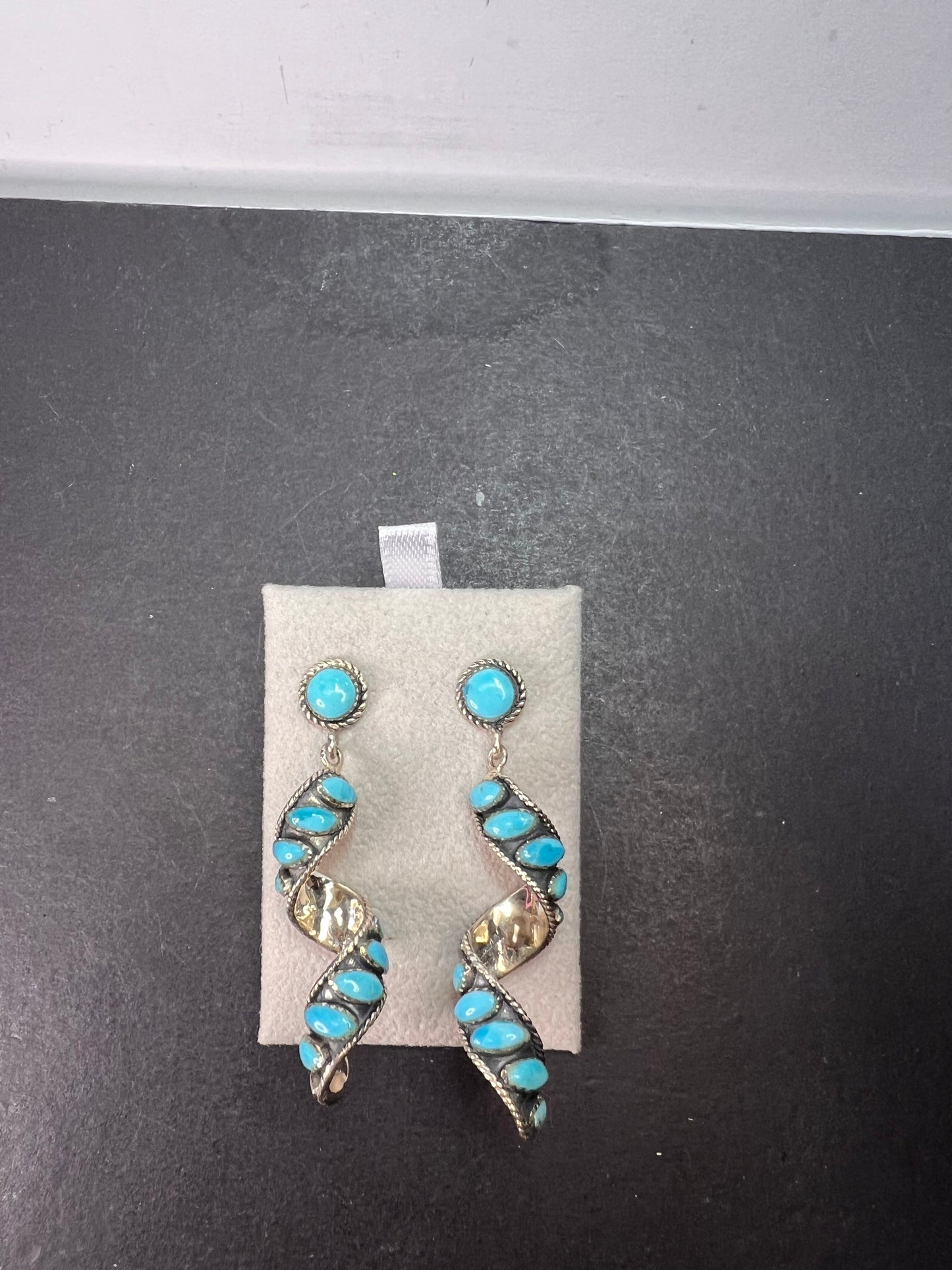 Santa Fe style Kingman turquoise swirl twisted drop sterling silver earrings