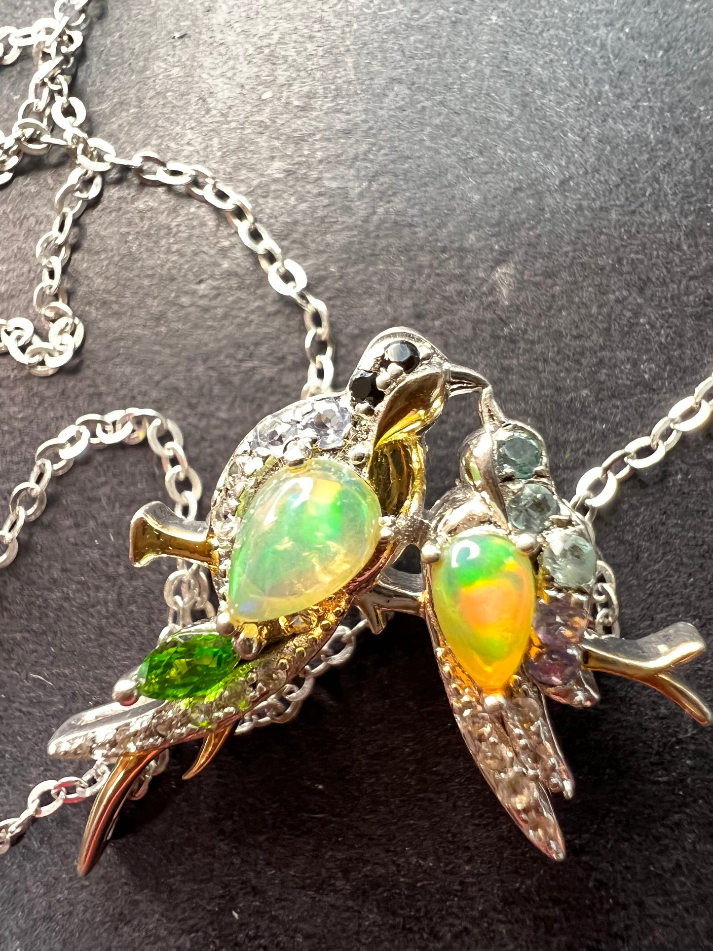 Ethiopian opal love birds multi gemstone two toned pendant and chain in gold and rhodium over sterling silver