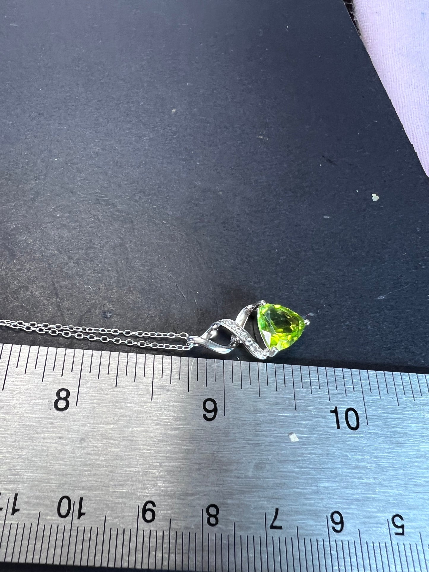 Trilliant cut peridot and sterling silver pendant and 18 inch chain