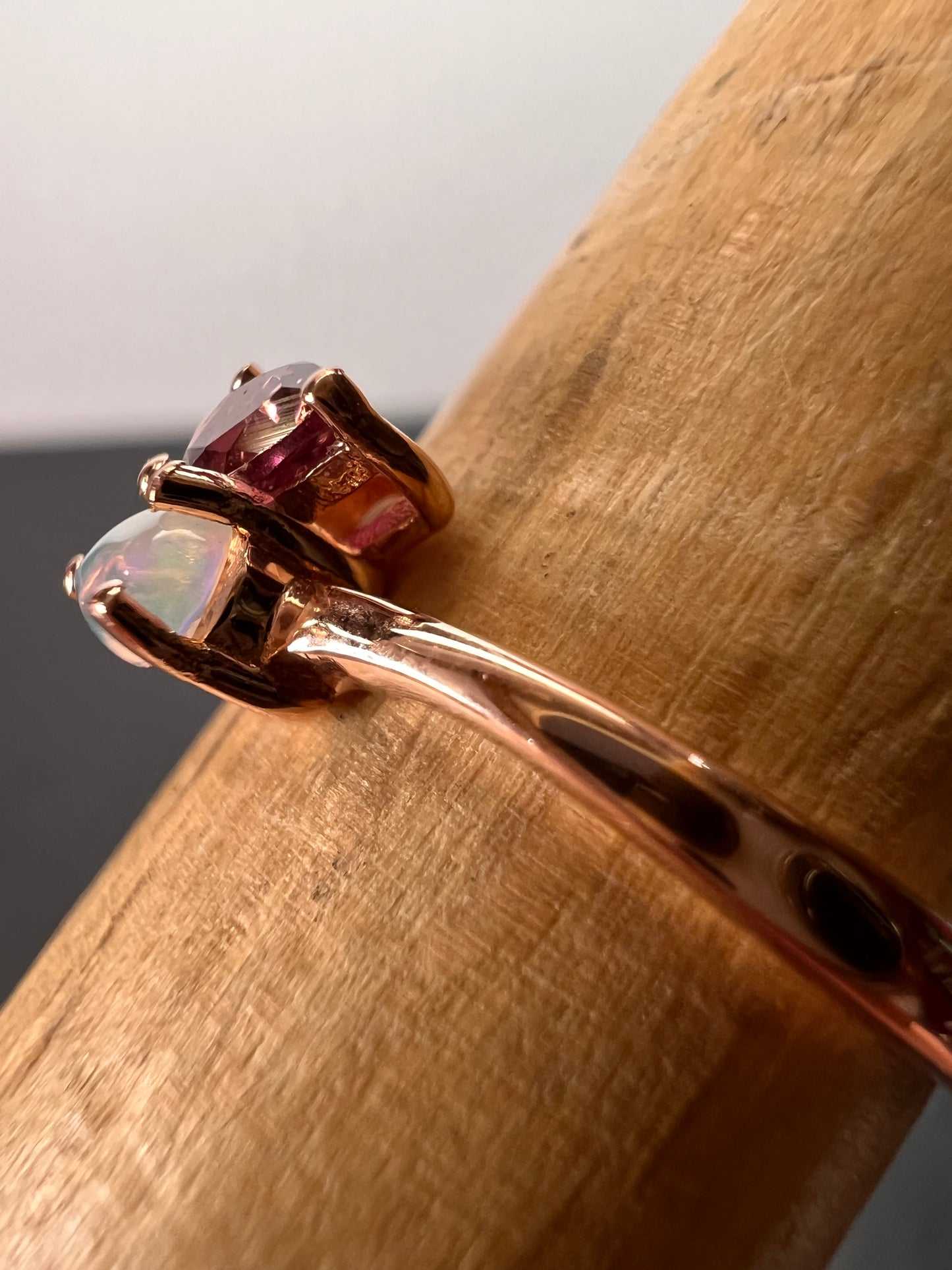 Rubellite and Ethiopian welo opal bypass ring in rose gold vermeil over sterling silver size 7. .35ctw