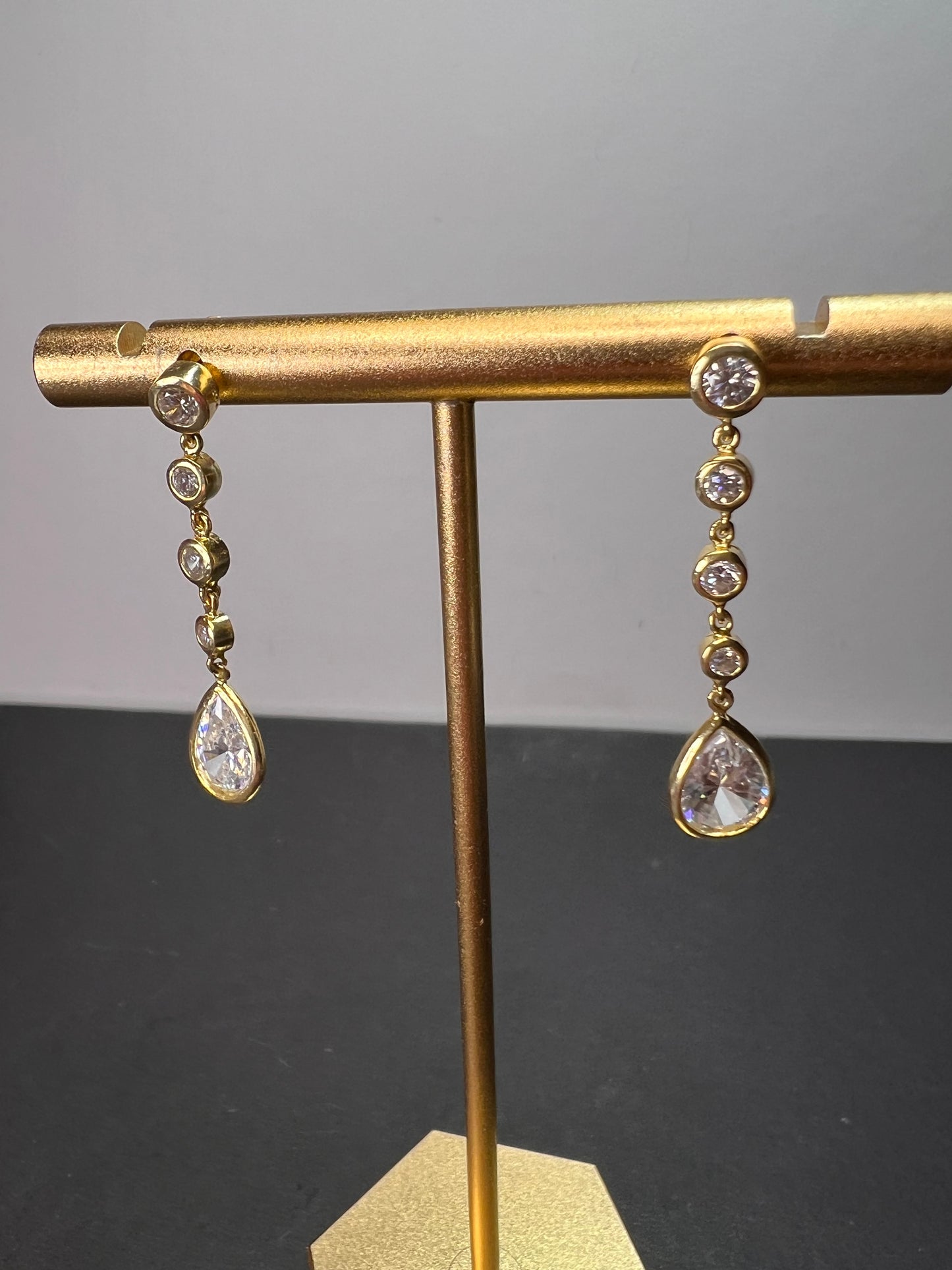 Long teardrop CZ earrings in gold over sterling silver