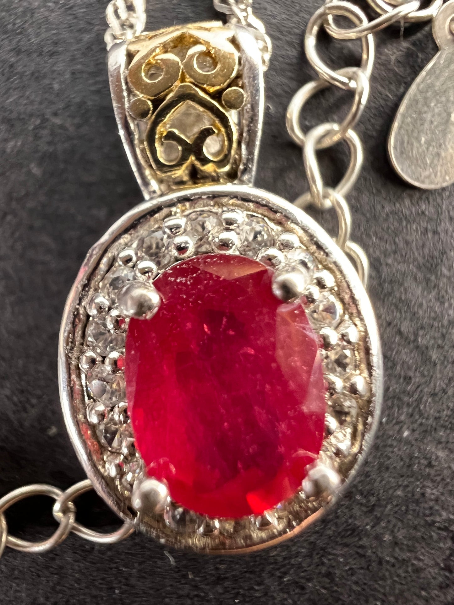 Ruby and zircon two toned halo pendant and chain necklace in sterling silver