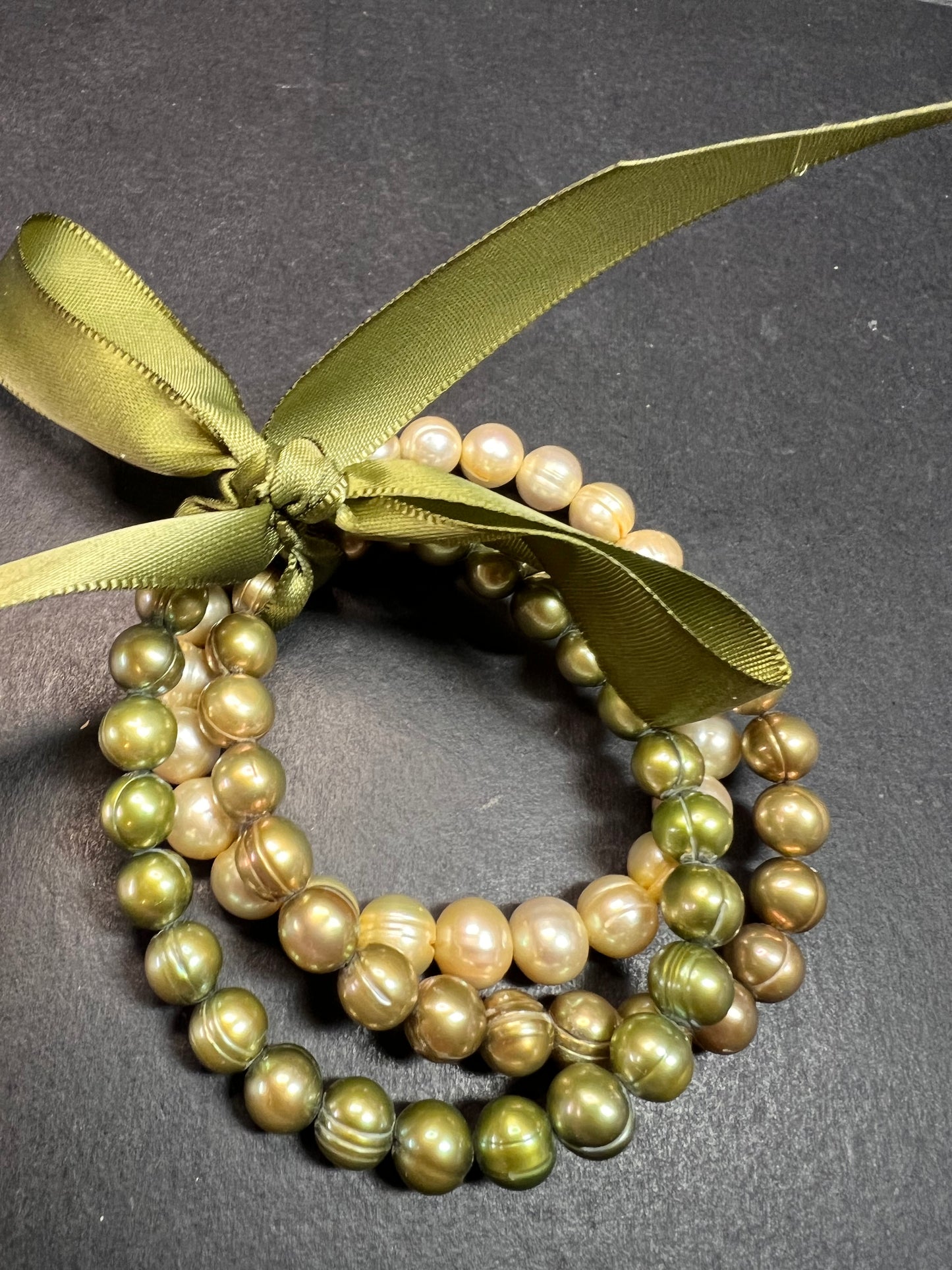 Set of three freshwater pearl shades of green stretch bracelets