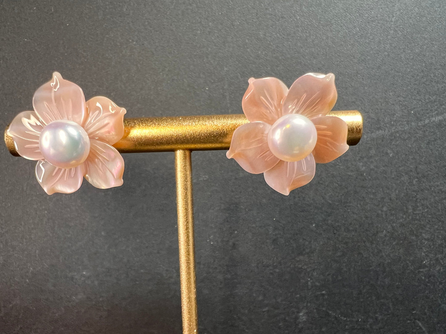 Vintage dead stock set of mother of pearl plumeria stud earrings in sterling silver