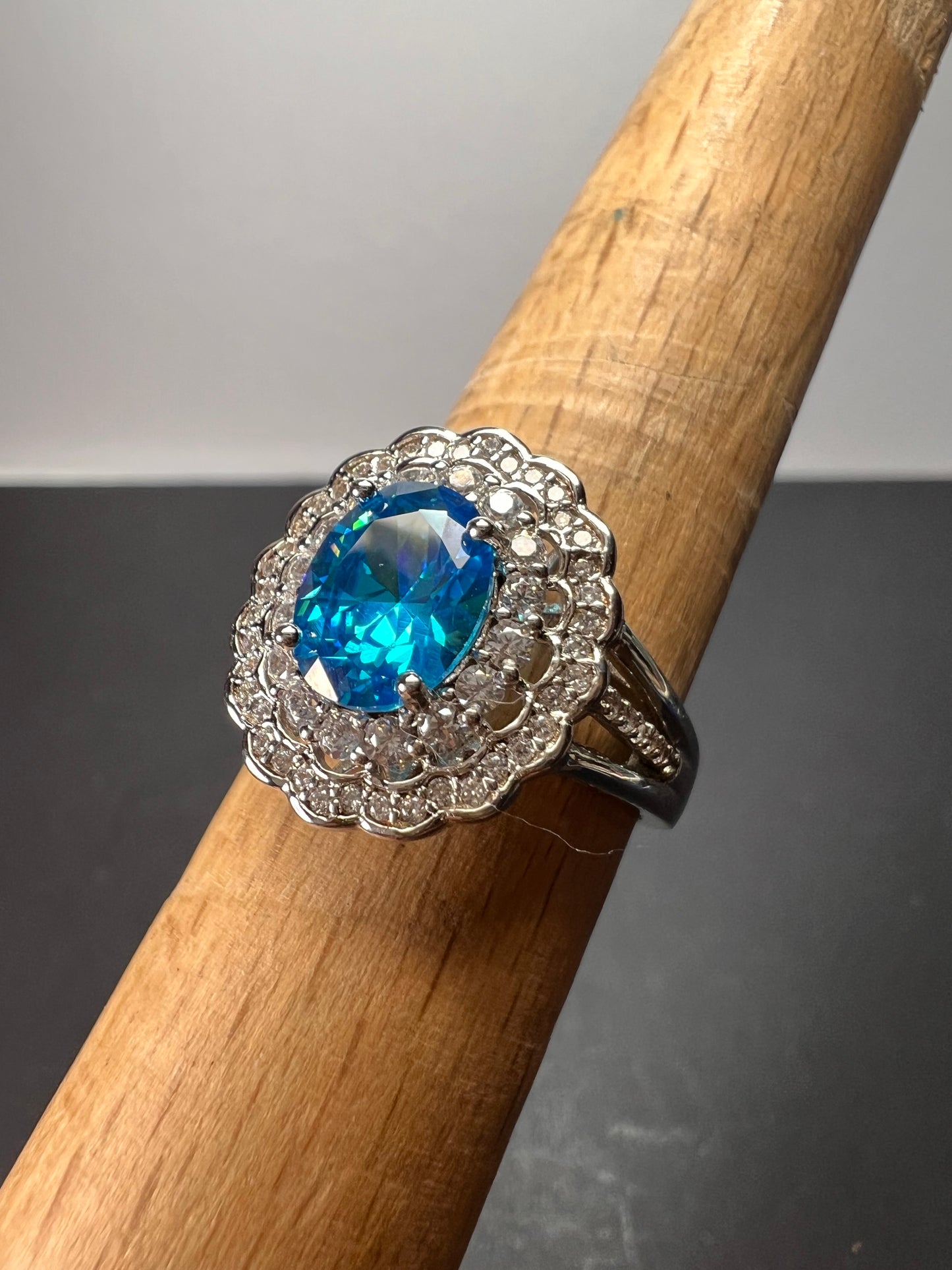 Blue and white CZ halo sterling silver ring size 8