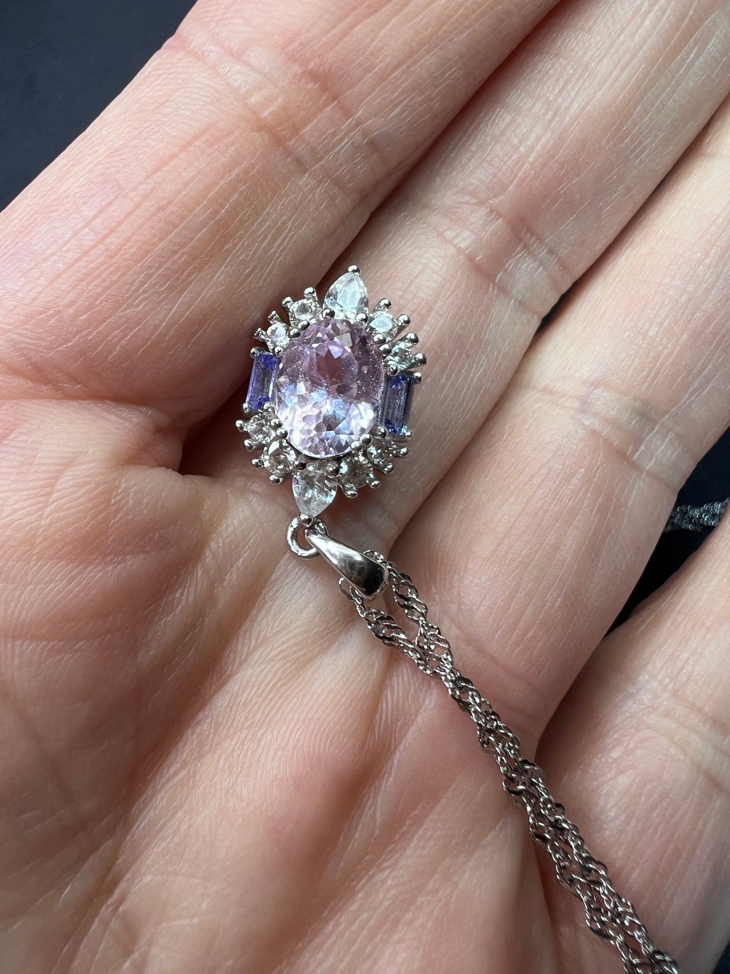 2.11ct Kunzite, 0.18ctw Tanzanite And 0.87ctw White Zircon Rhodium Over Silver halo Pendant With Chain