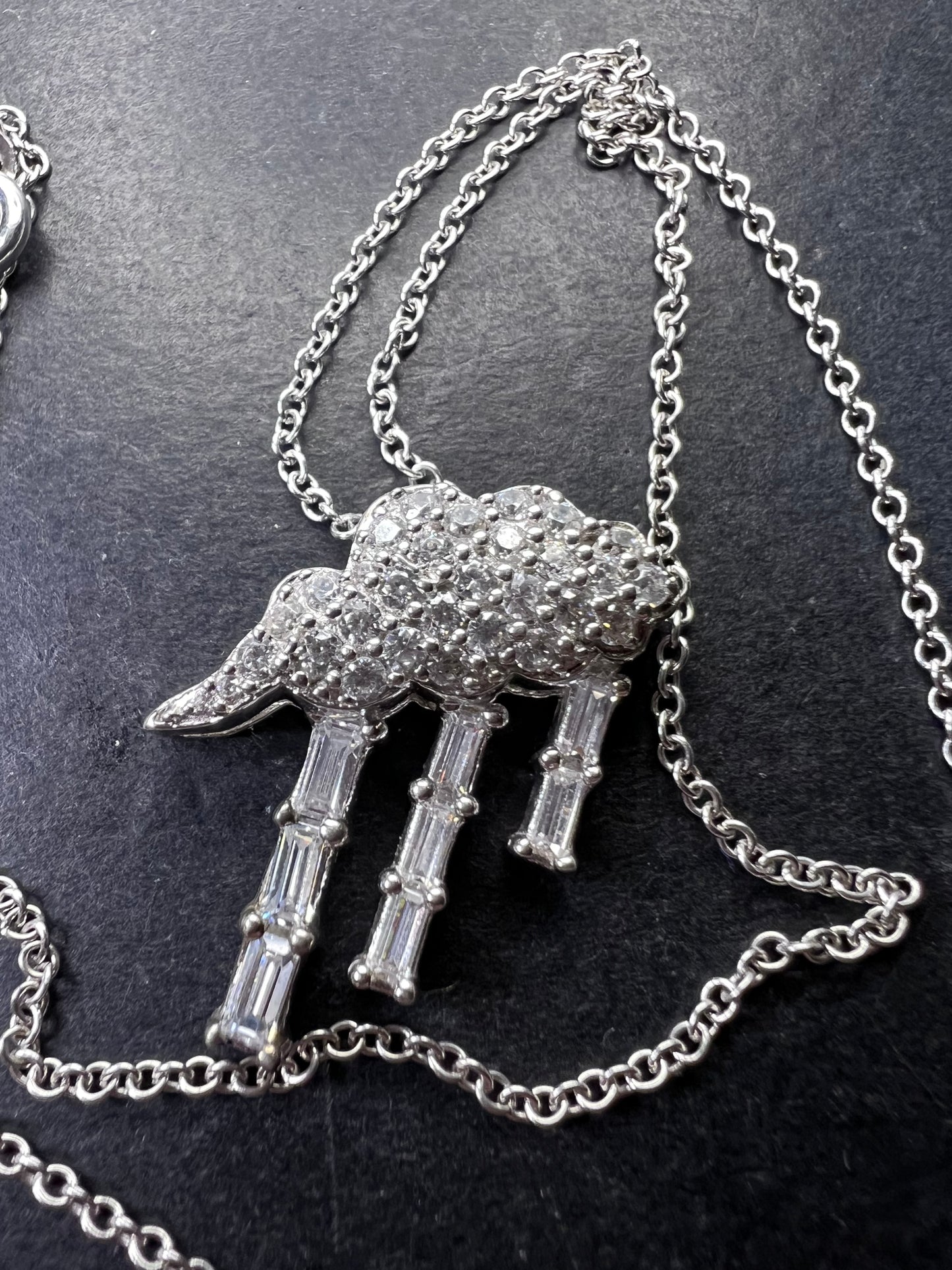 Sterling silver rain cloud pendant by Remy Rotenier