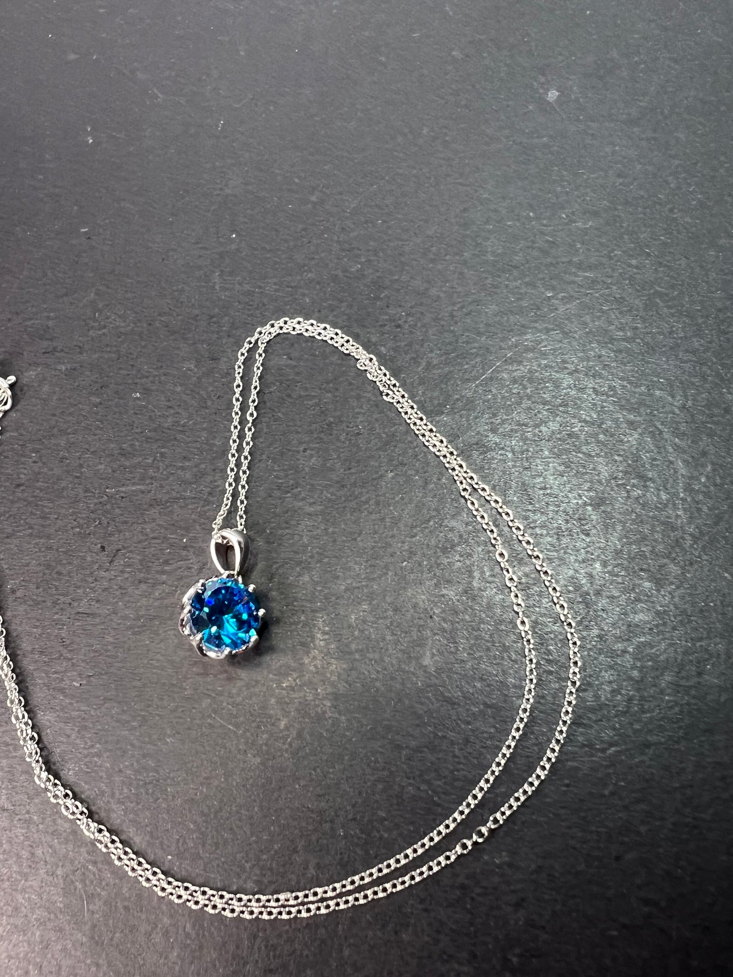 YGI blue CZ rhodium over sterling silver solitaire pendant and chain