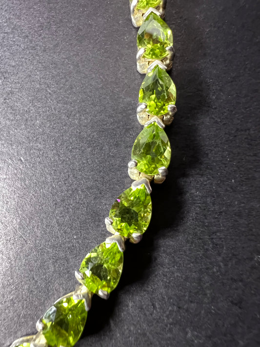 Peridot and sterling silver tennis bracelet