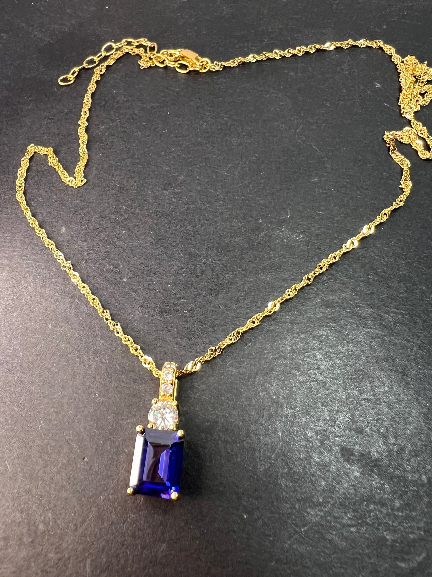 Blue emerald cut CZ pendant and chain necklace in gold over sterling silver 18 inches