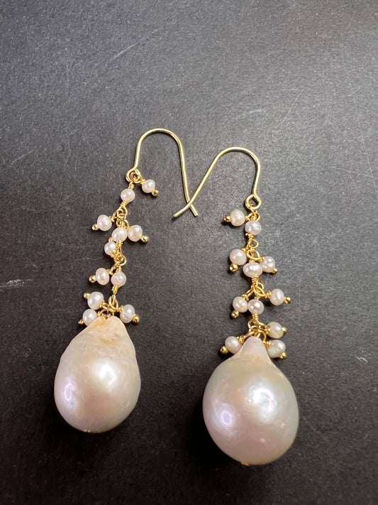 Baroque pearl dangle earrings in yellow gold over sterling silver