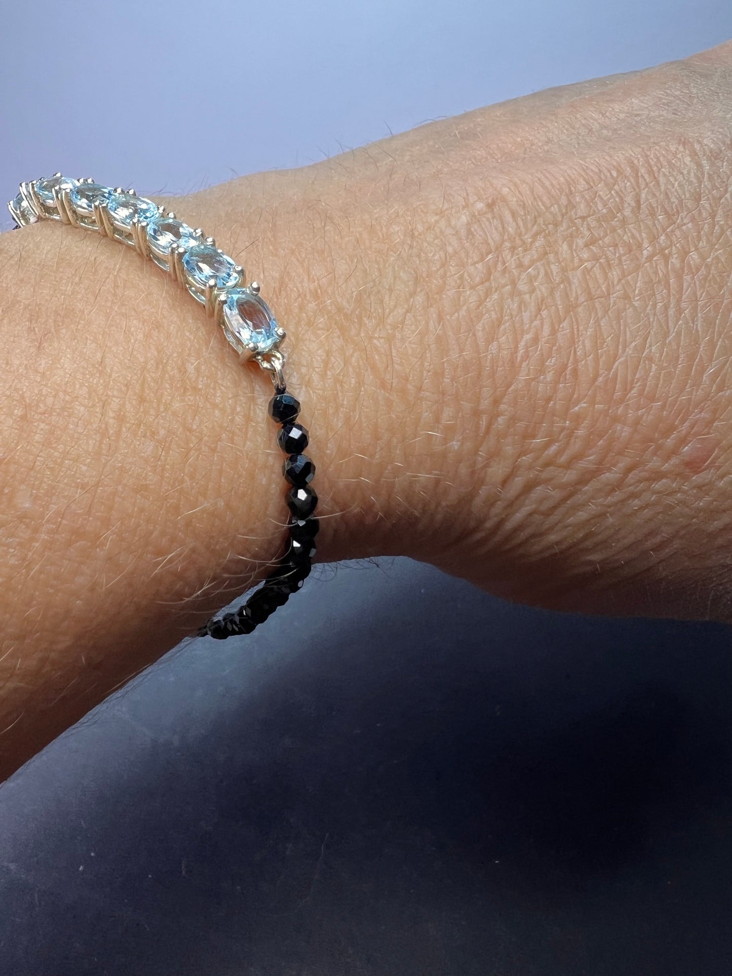 Black spinel and blue topaz bracelet with sterling lobster clasp