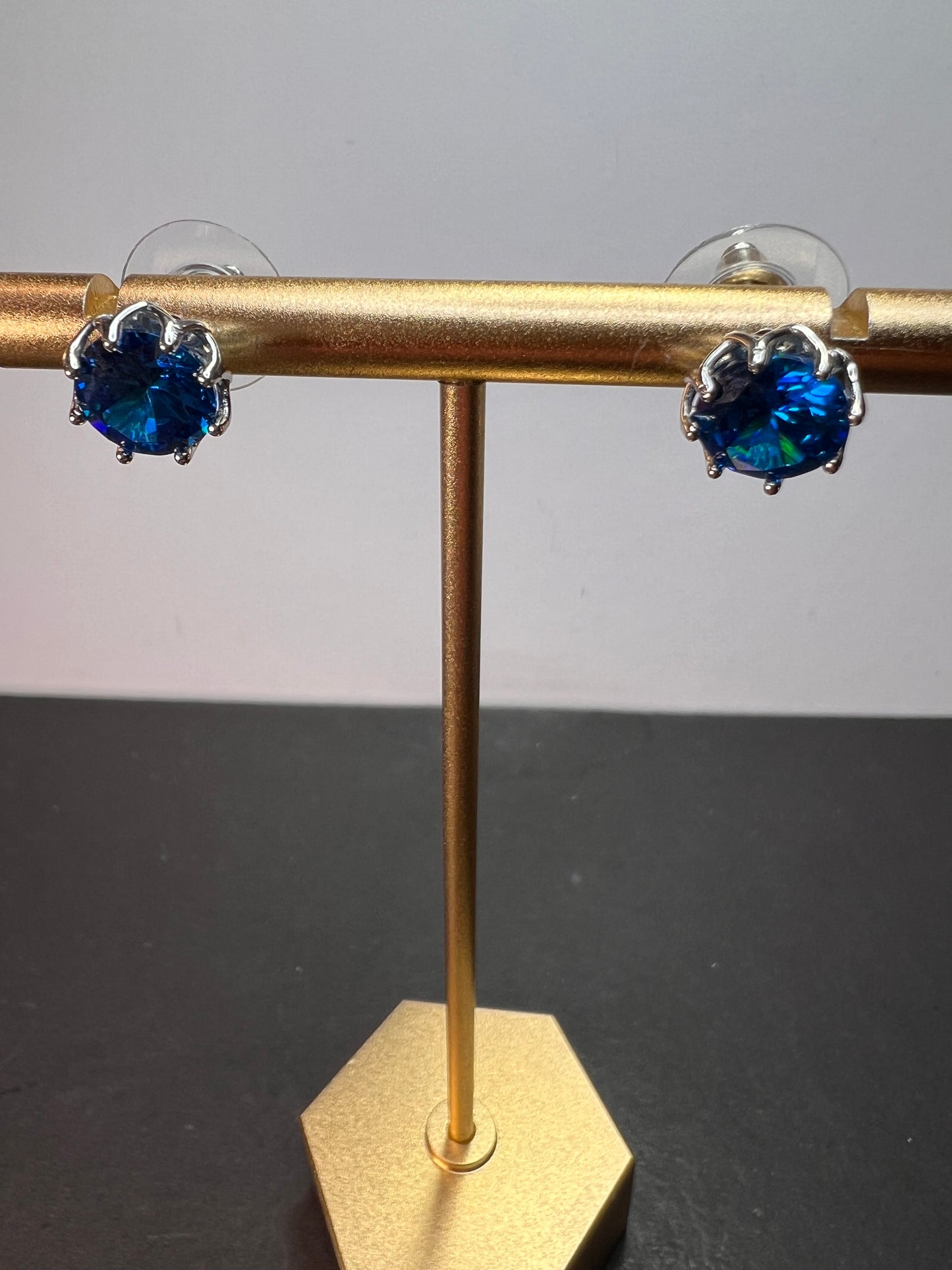 YGI blue CZ rhodium over sterling silver solitaire stud earrings