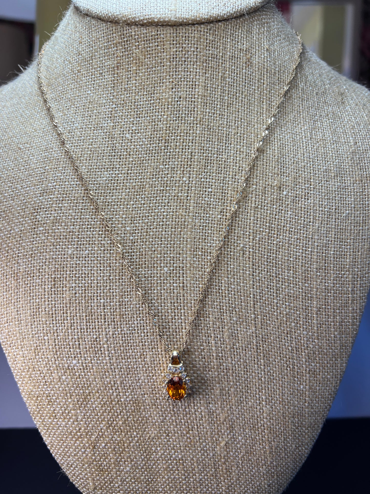 Mandarin citrine and white topaz halo pendant necklace in 14k gold over sterling silver