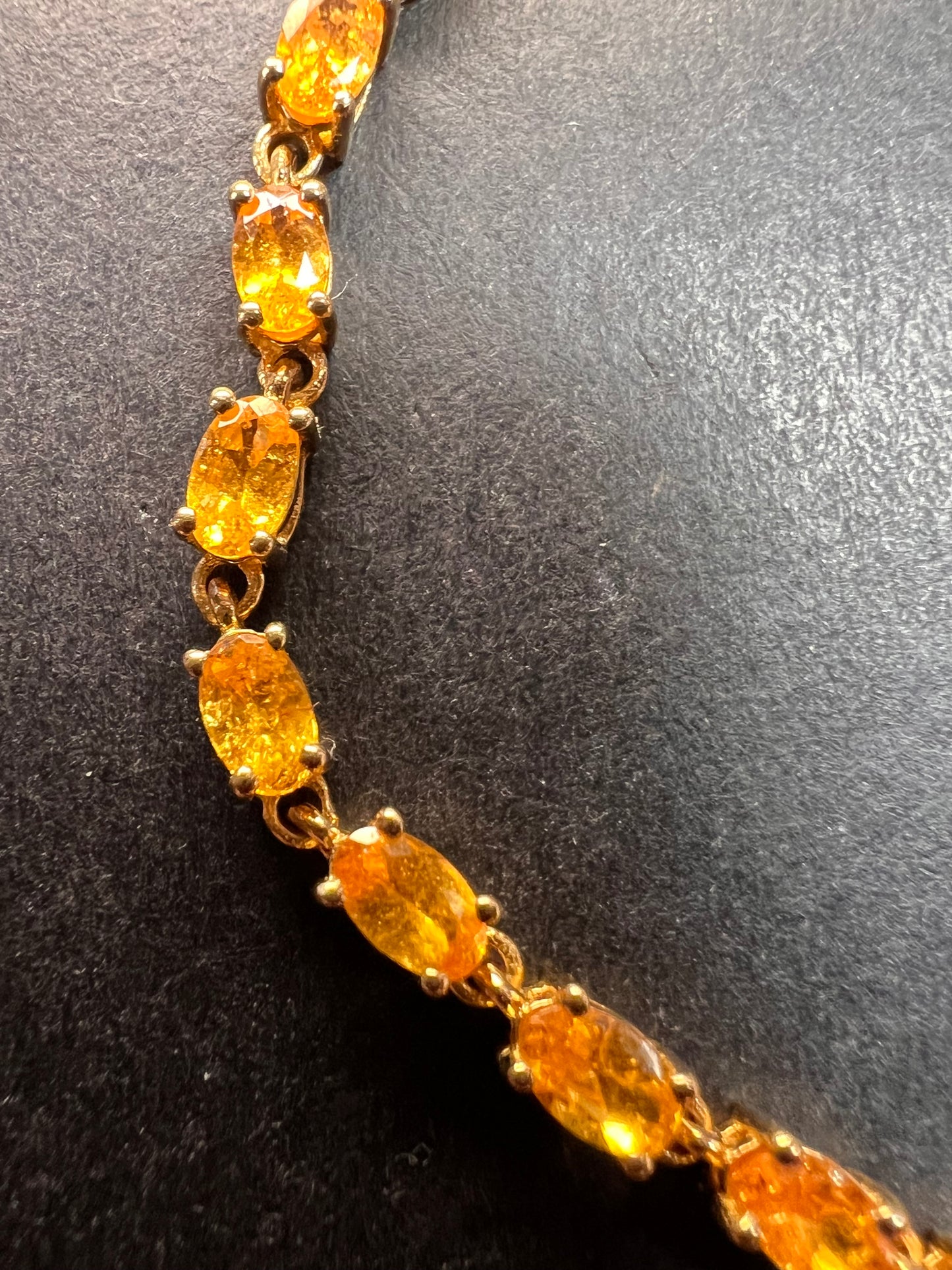 Yellow spessartine garnet tennis bracelet in gold over sterling silver