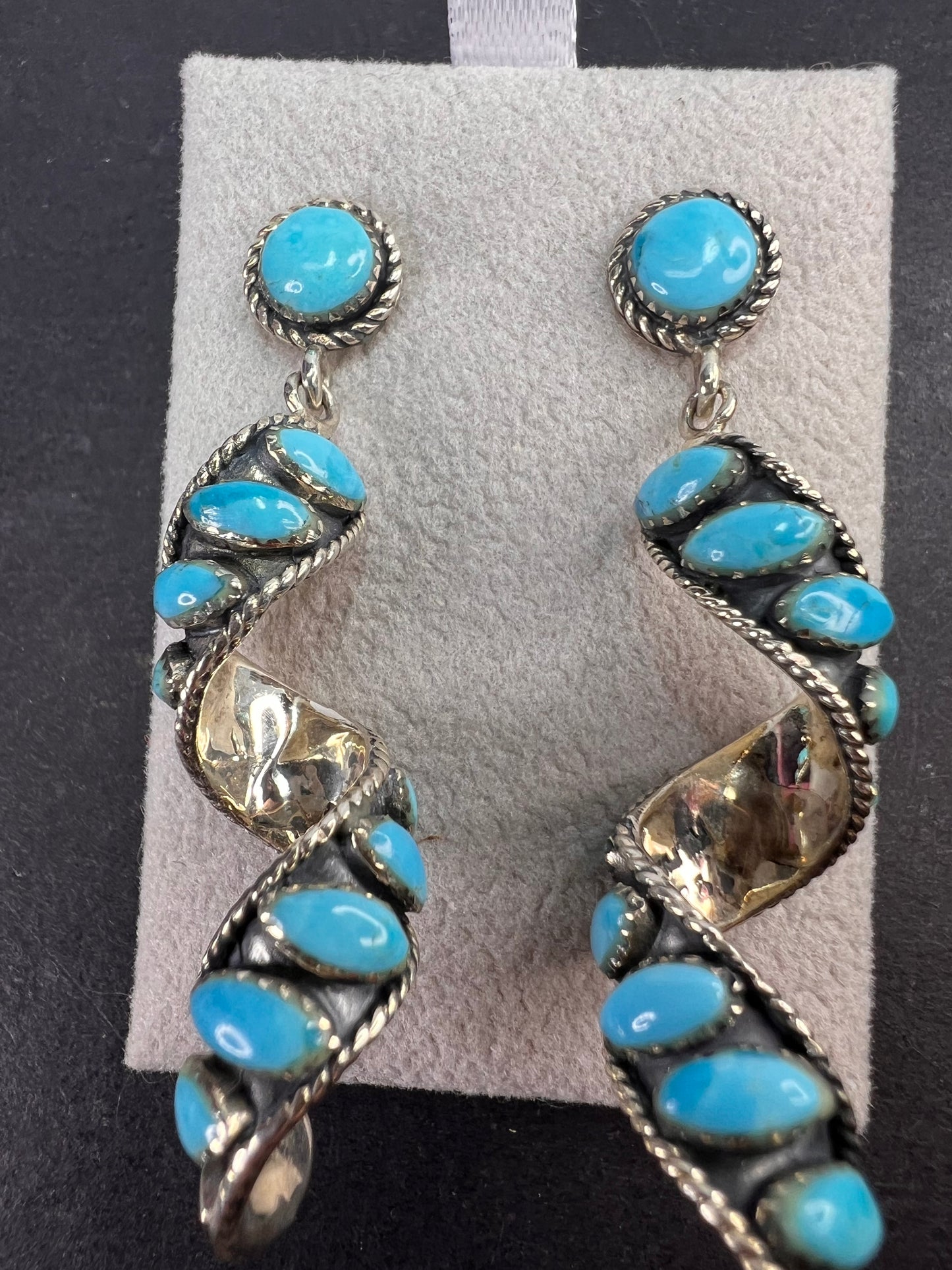 Santa Fe style Kingman turquoise swirl twisted drop sterling silver earrings