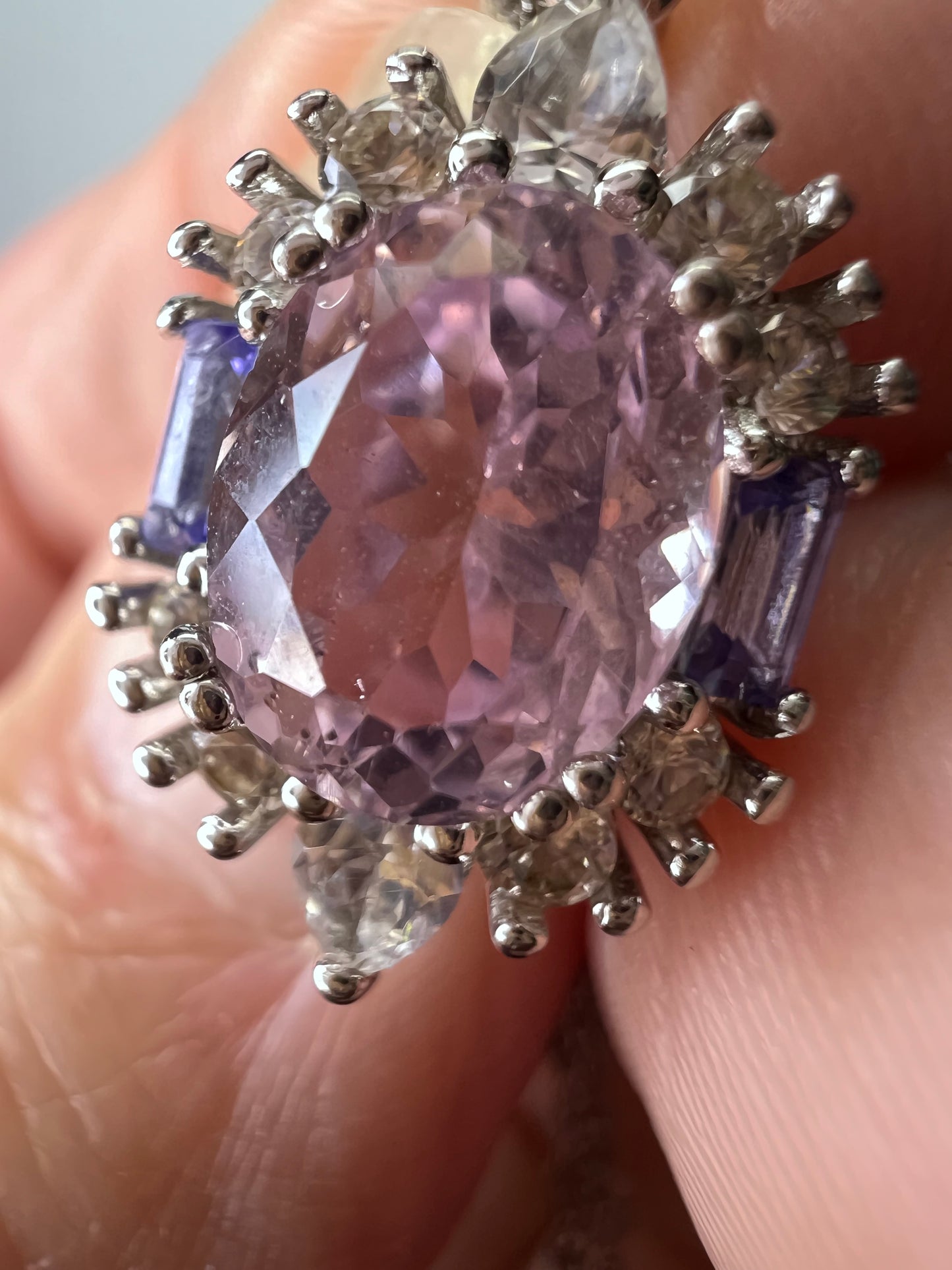 2.11ct Kunzite, 0.18ctw Tanzanite And 0.87ctw White Zircon Rhodium Over Silver halo Pendant With Chain