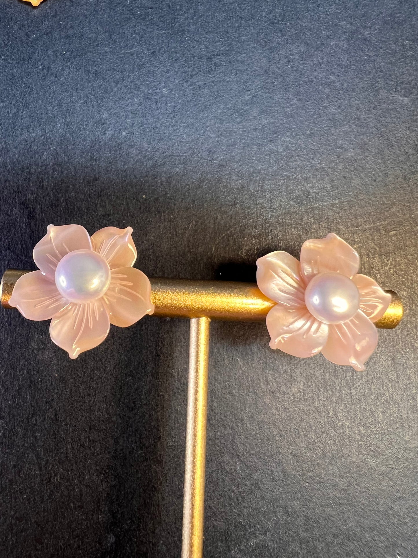 Vintage dead stock set of mother of pearl plumeria stud earrings in sterling silver