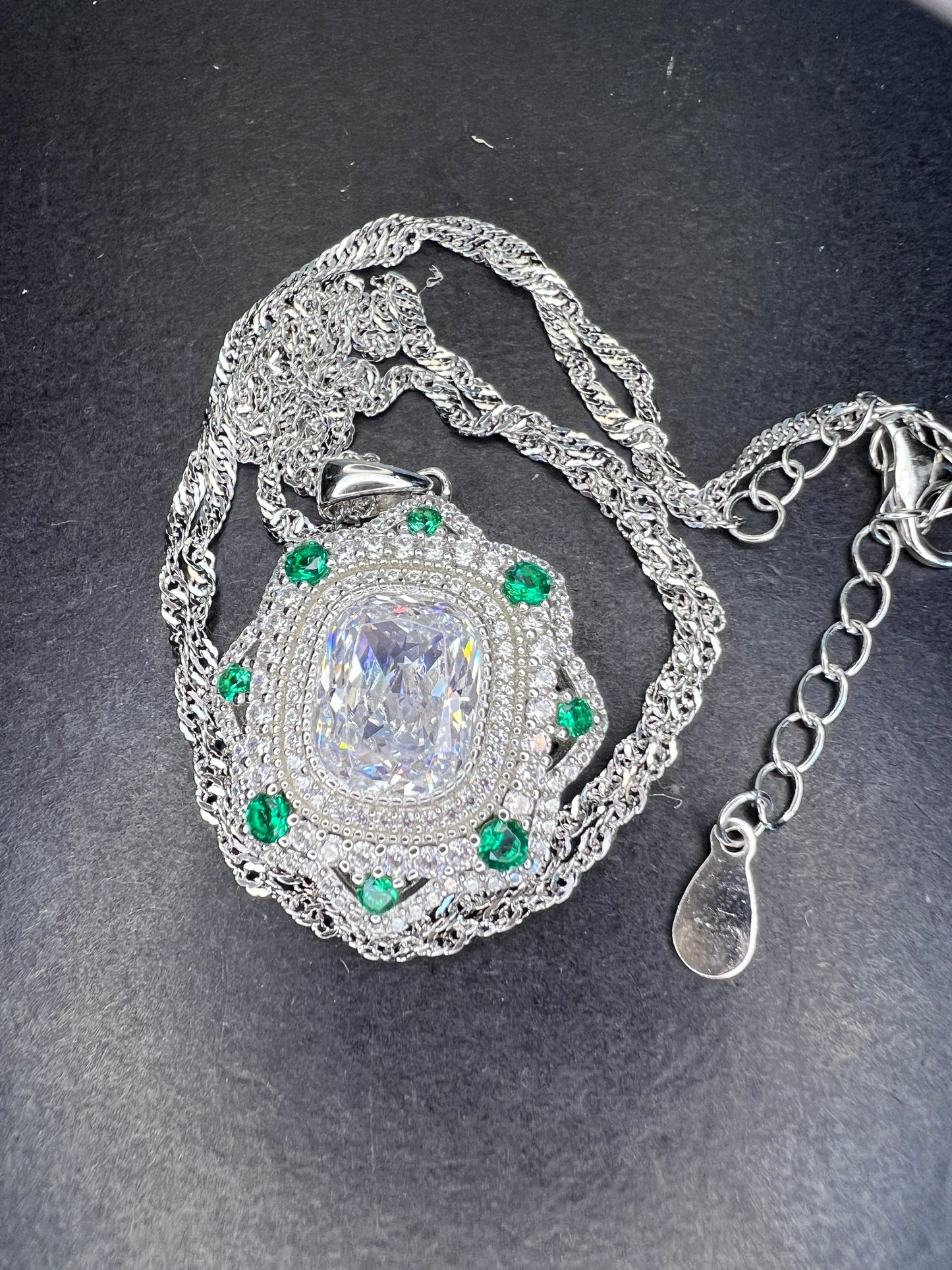 Bella Luce lab created green spinel and diamond simulant rhodium over sterling silver pendant with 18 inch chain necklace