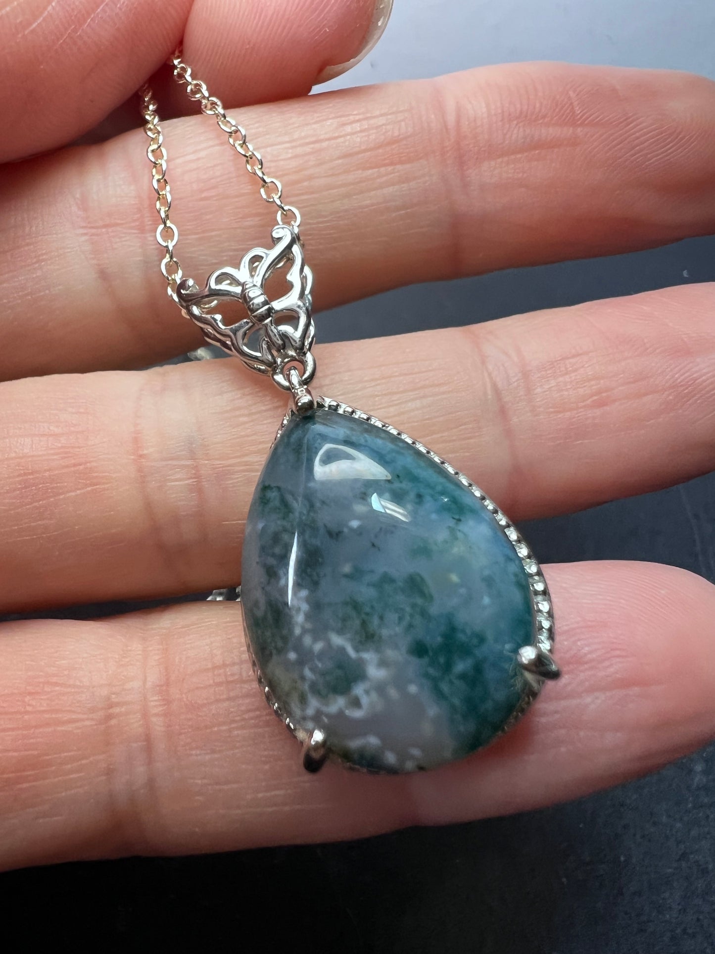 Moss agate teardrop pendant with butterfly in platinum over copper with 18 inch chain