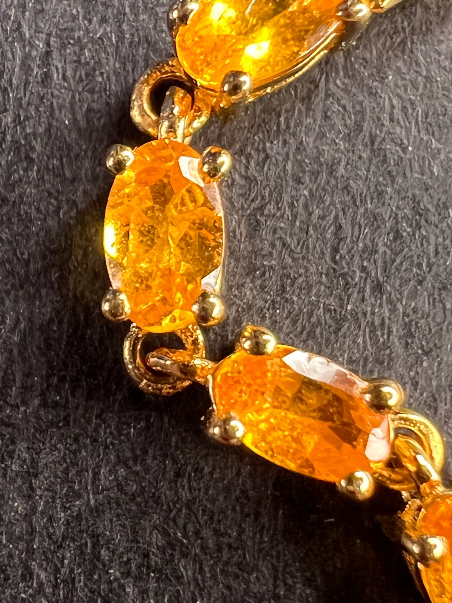 Yellow spessartine garnet tennis bracelet in gold over sterling silver