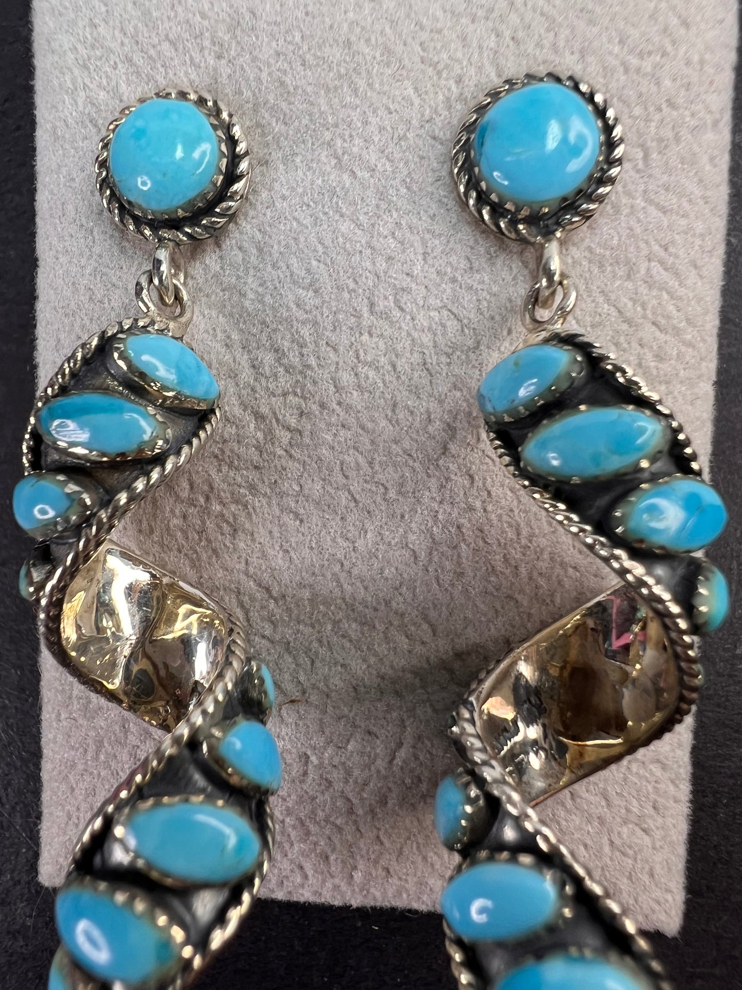 Santa Fe style Kingman turquoise swirl twisted drop sterling silver earrings