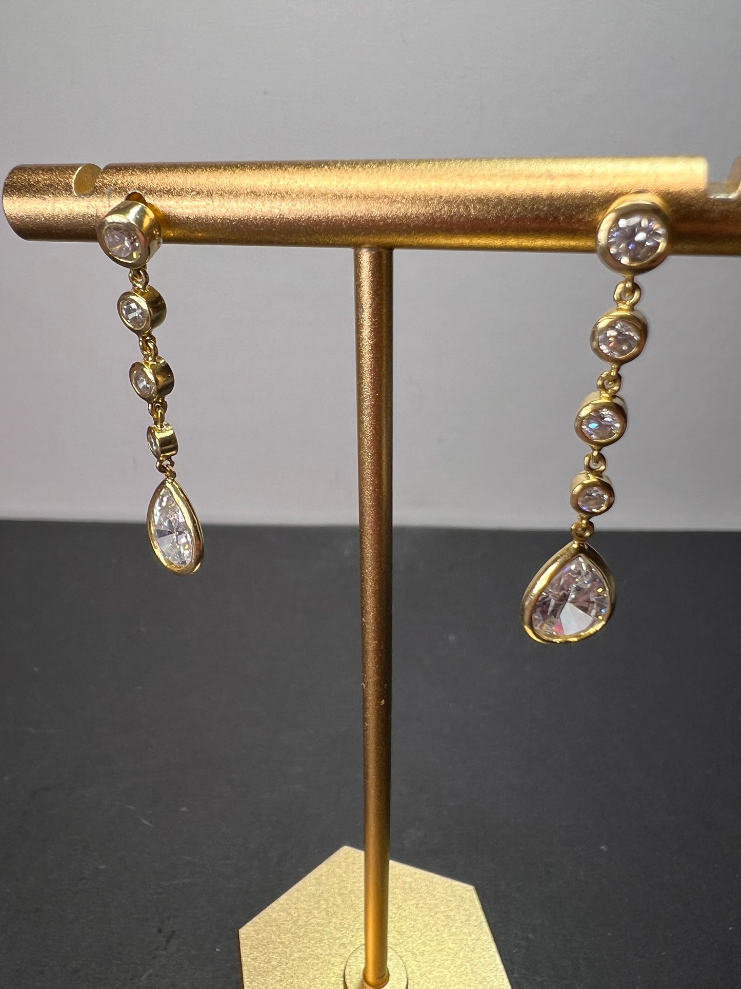 Long teardrop CZ earrings in gold over sterling silver