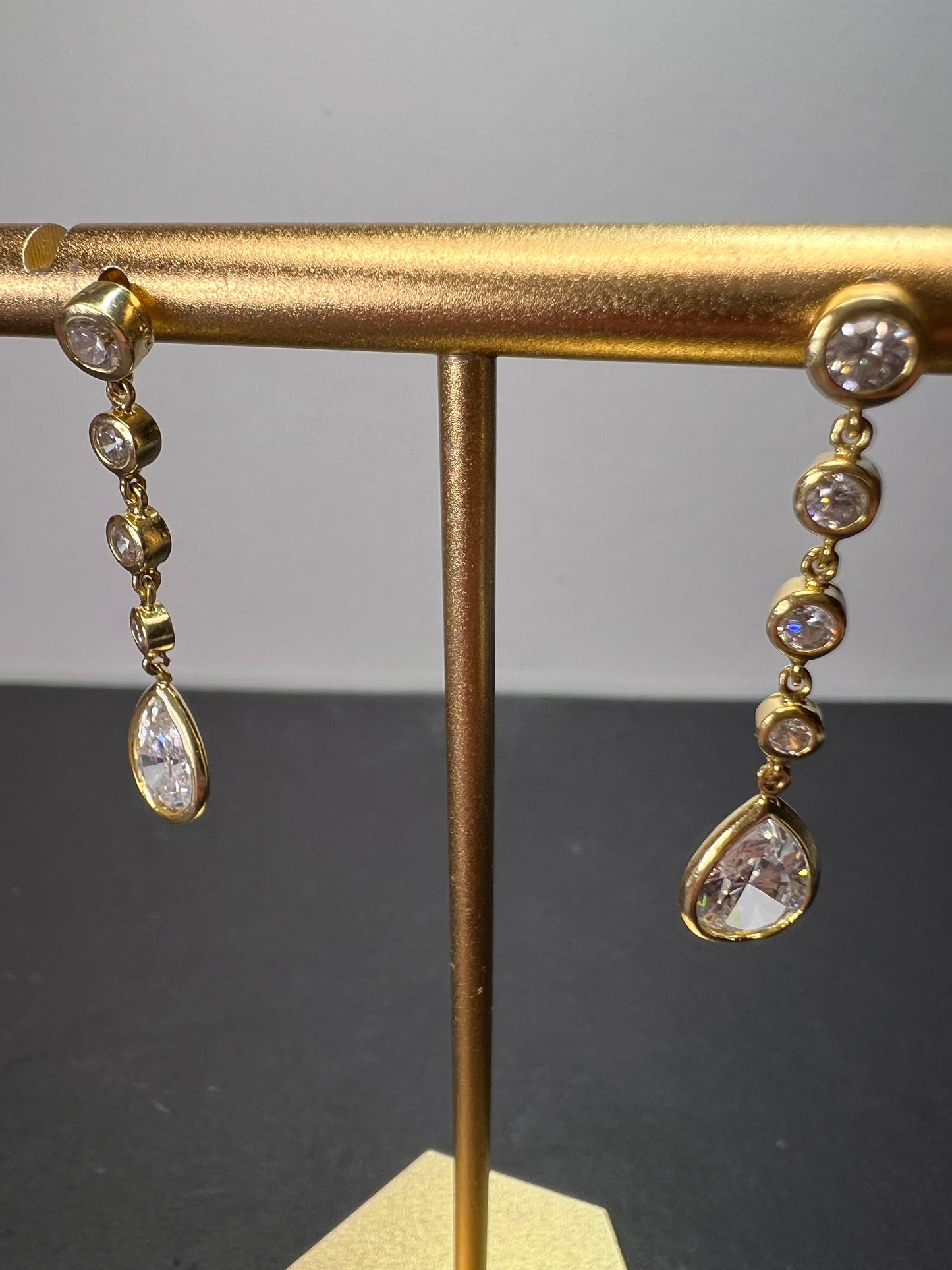 Long teardrop CZ earrings in gold over sterling silver