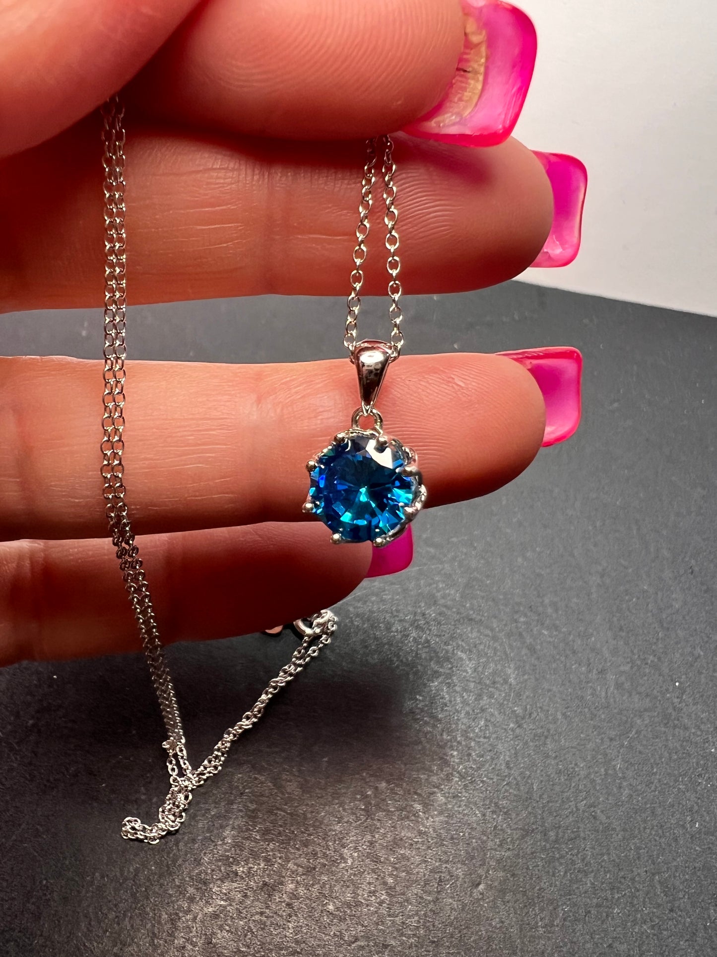 YGI blue CZ rhodium over sterling silver solitaire pendant and chain