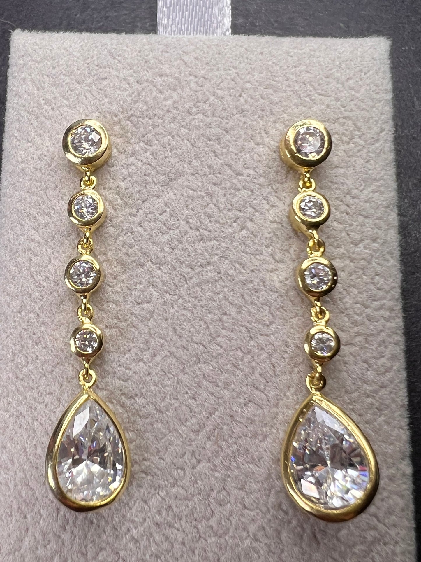 Long teardrop CZ earrings in gold over sterling silver