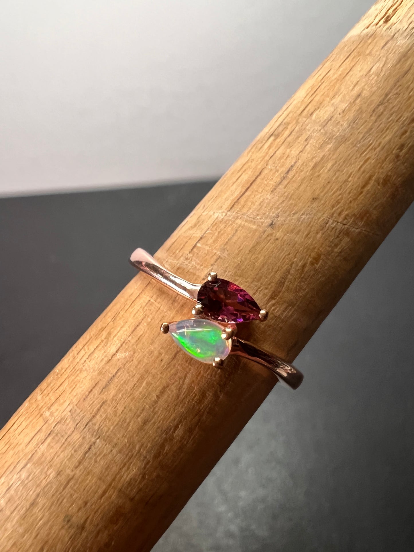 Rubellite and Ethiopian welo opal bypass ring in rose gold vermeil over sterling silver size 7. .35ctw